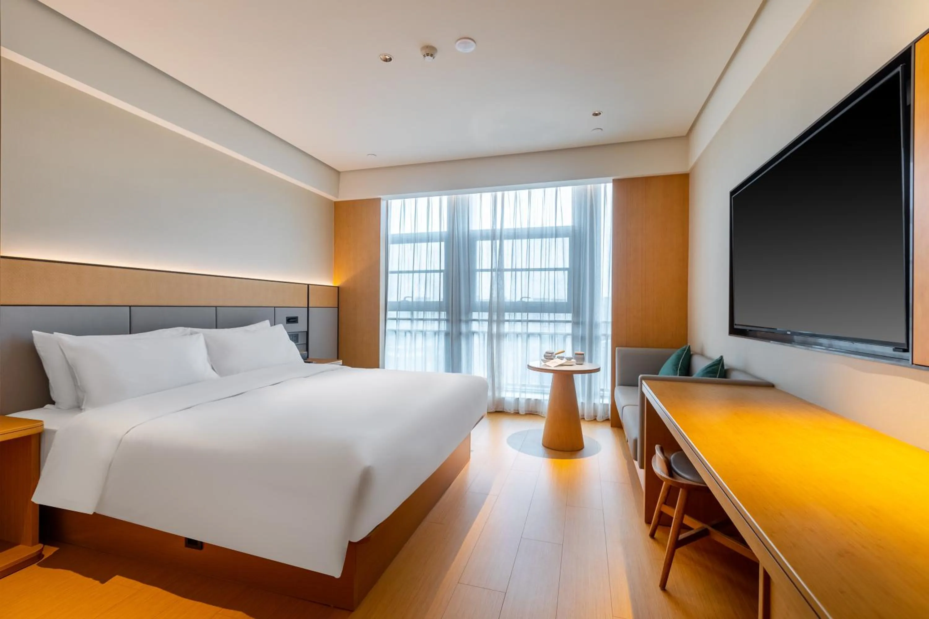 Bed in JI Hotel Nanjing Gaochun Crab City