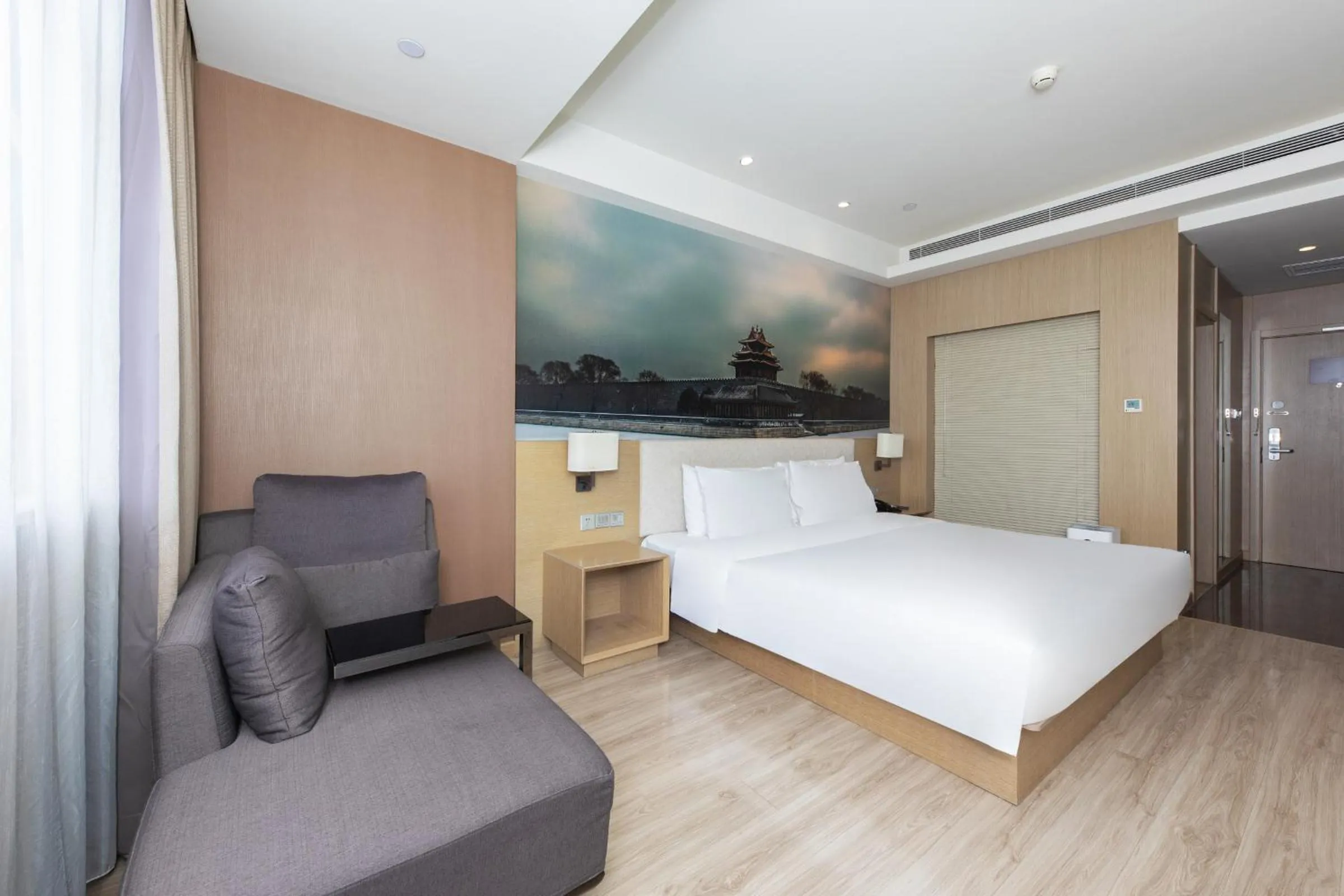 Bed in Orange Hotel Beijing Yizhuang Bridge Subway Station