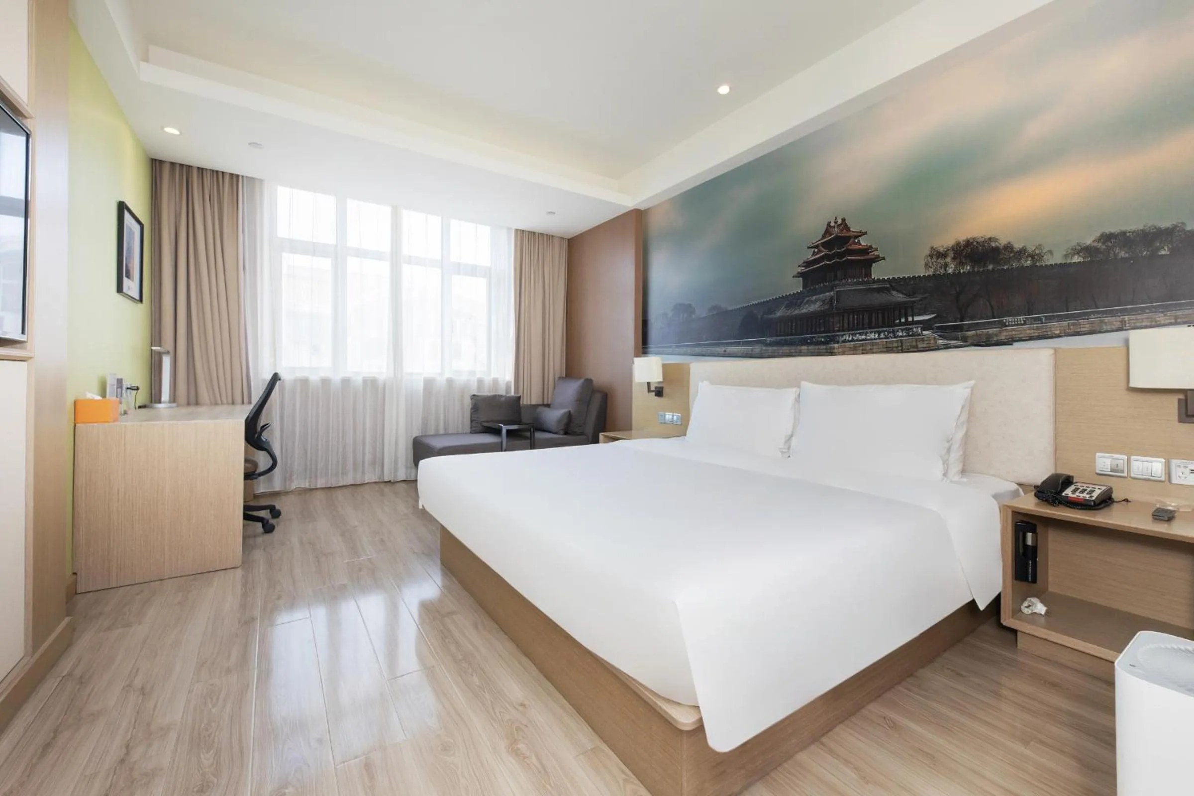 Seating area, Bed in Orange Hotel Beijing Yizhuang Bridge Subway Station