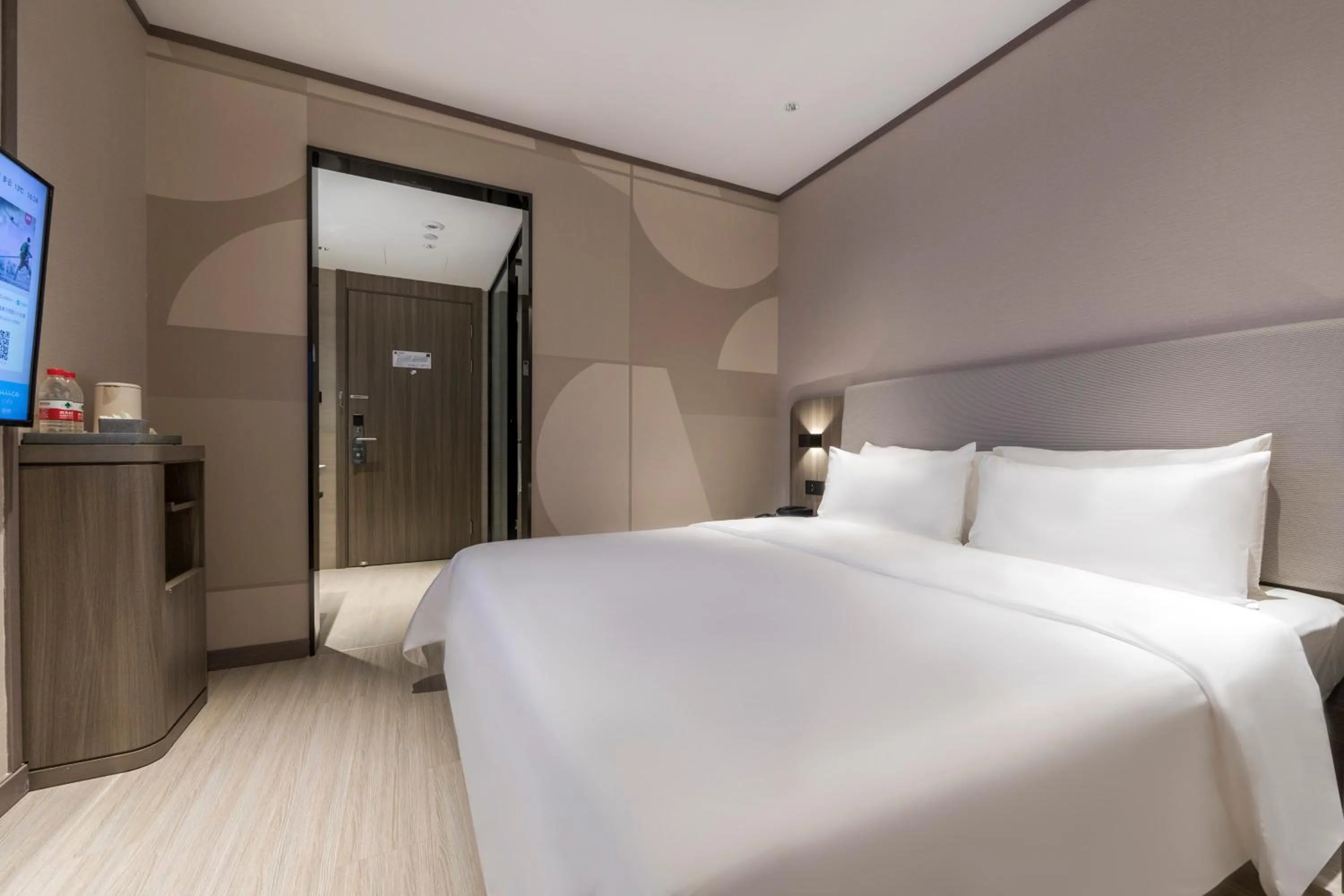 Bed in Hanting Hotel Shanghai South Station East China University of Science and Technology