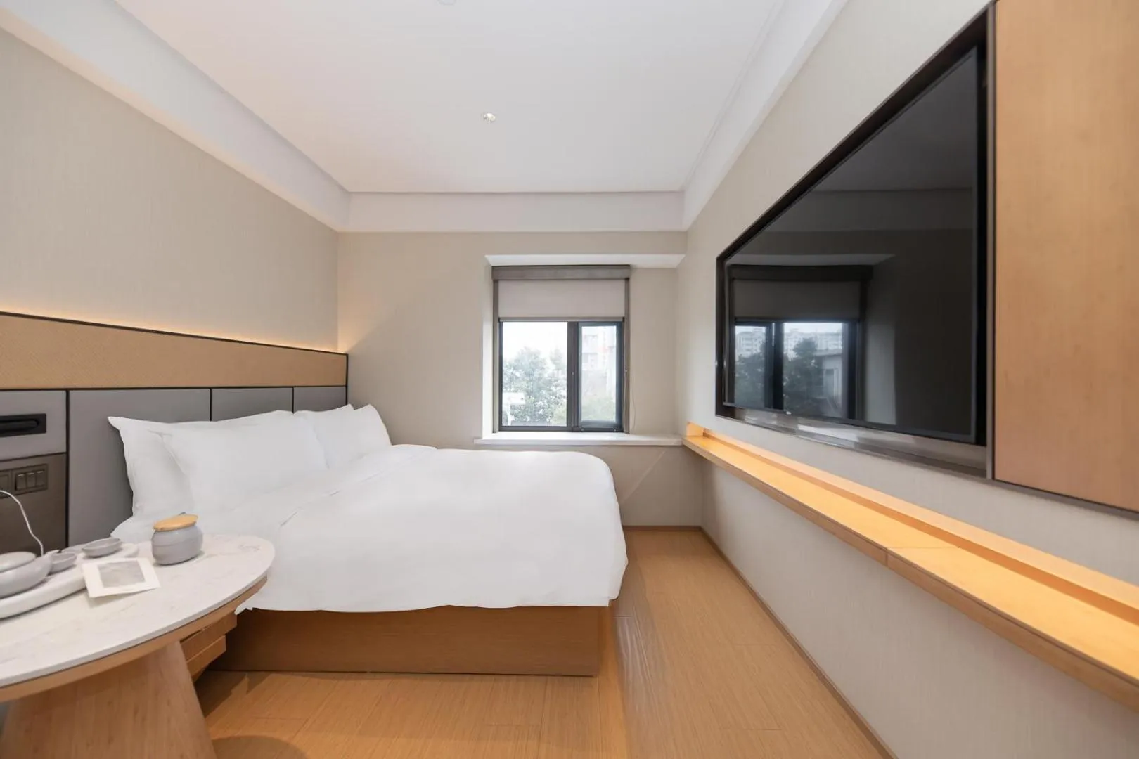 Bed in JI Hotel Shanghai Xinzhuang Qixin Road Qixin Road