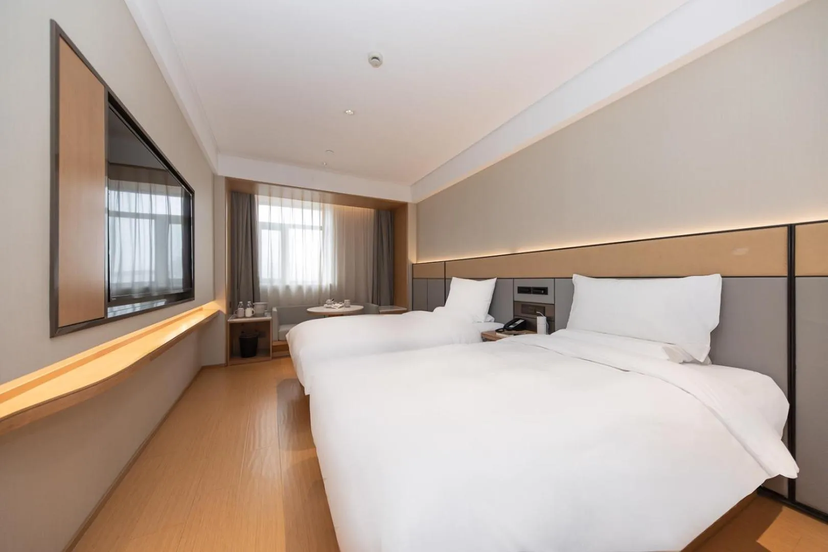 Bed in JI Hotel Shanghai Xinzhuang Qixin Road Qixin Road