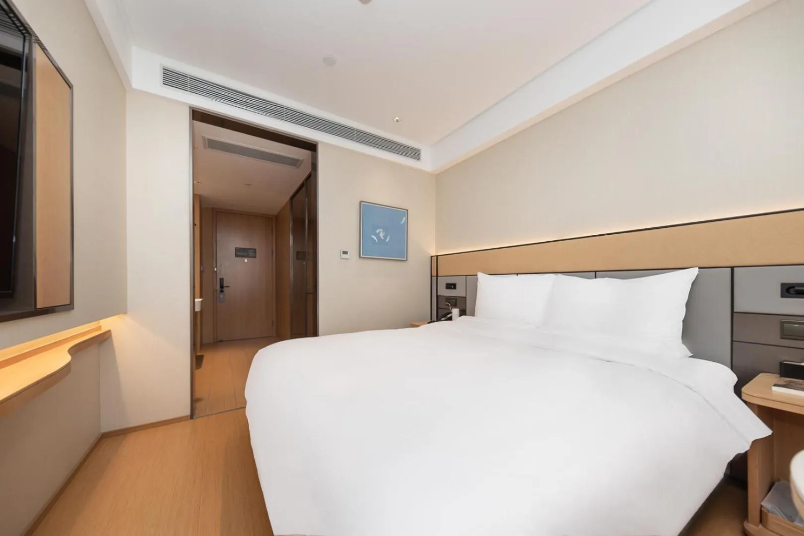 Bed in JI Hotel Shanghai Xinzhuang Qixin Road Qixin Road