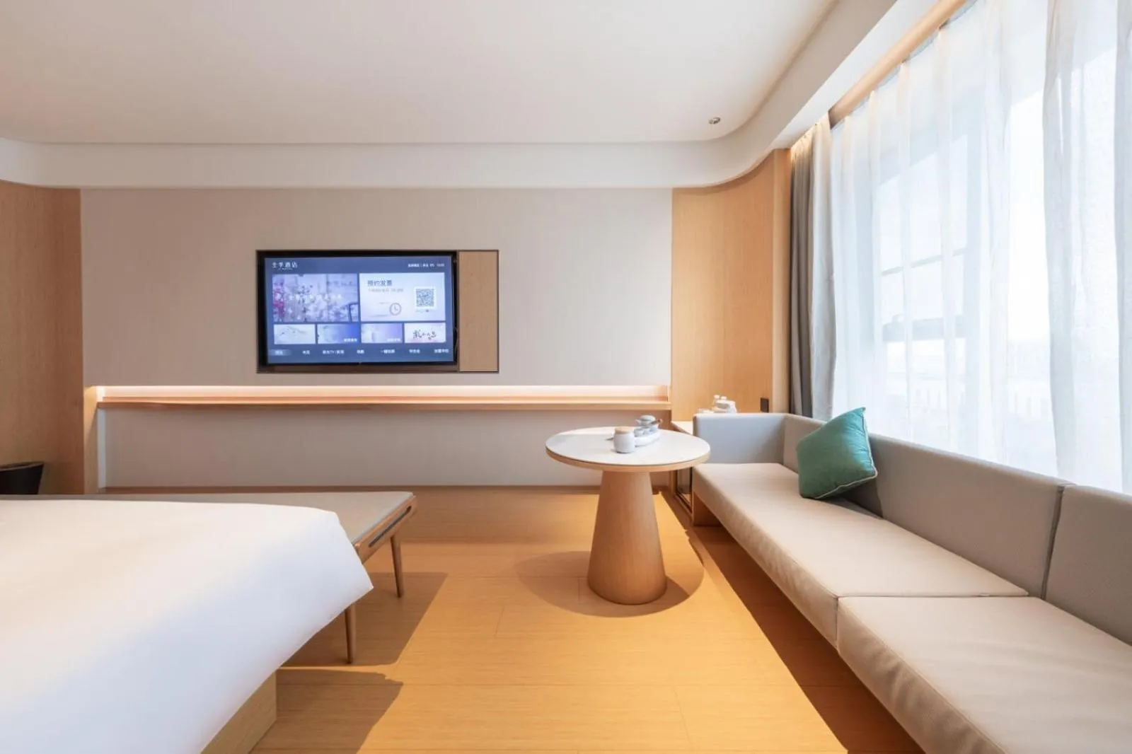 Living room, Bed in JI Hotel Chengdu Longquan Economic Development Zone Auto City