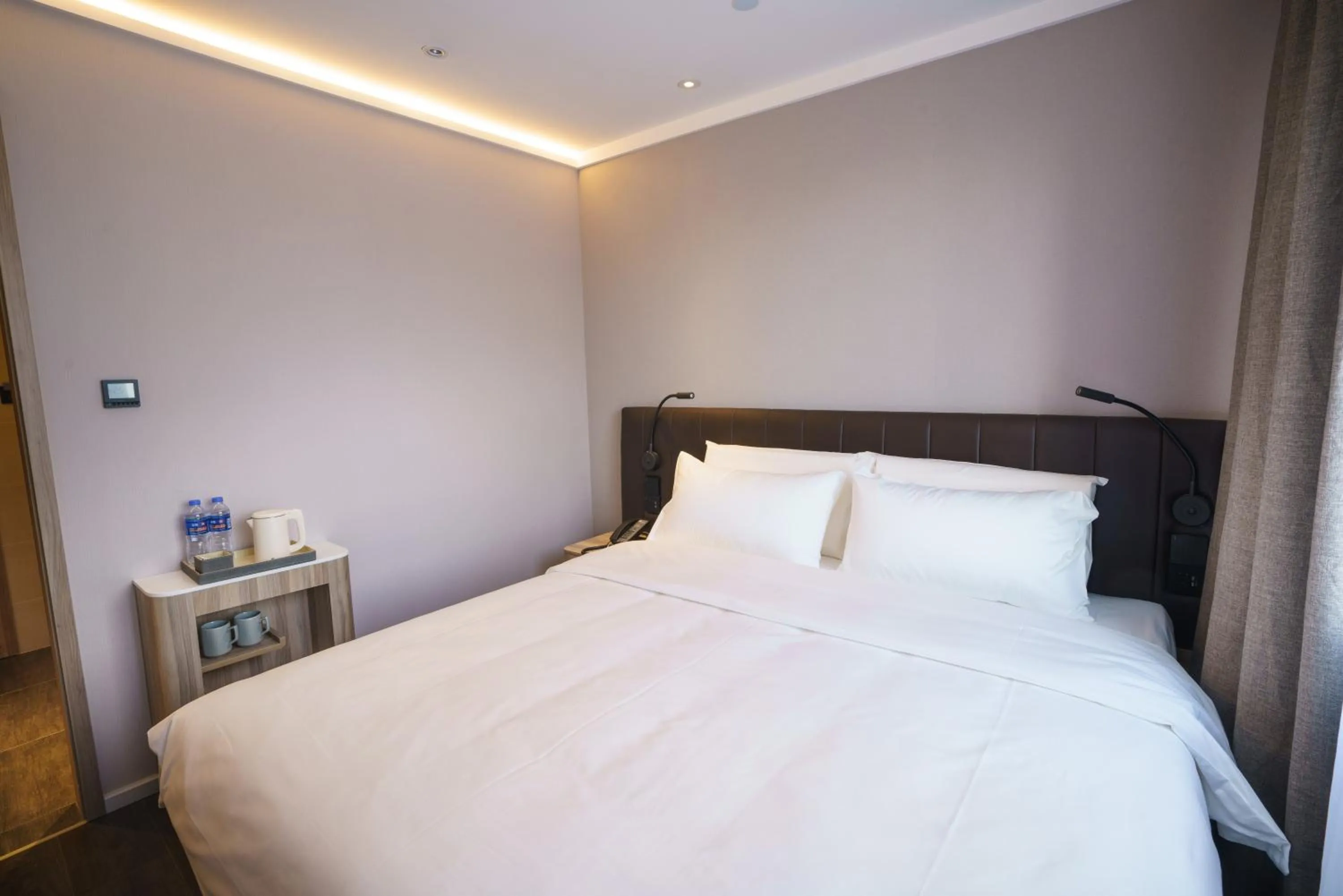 Bed in Hanting Hotel Beijing South Railway Station Muxiyuan