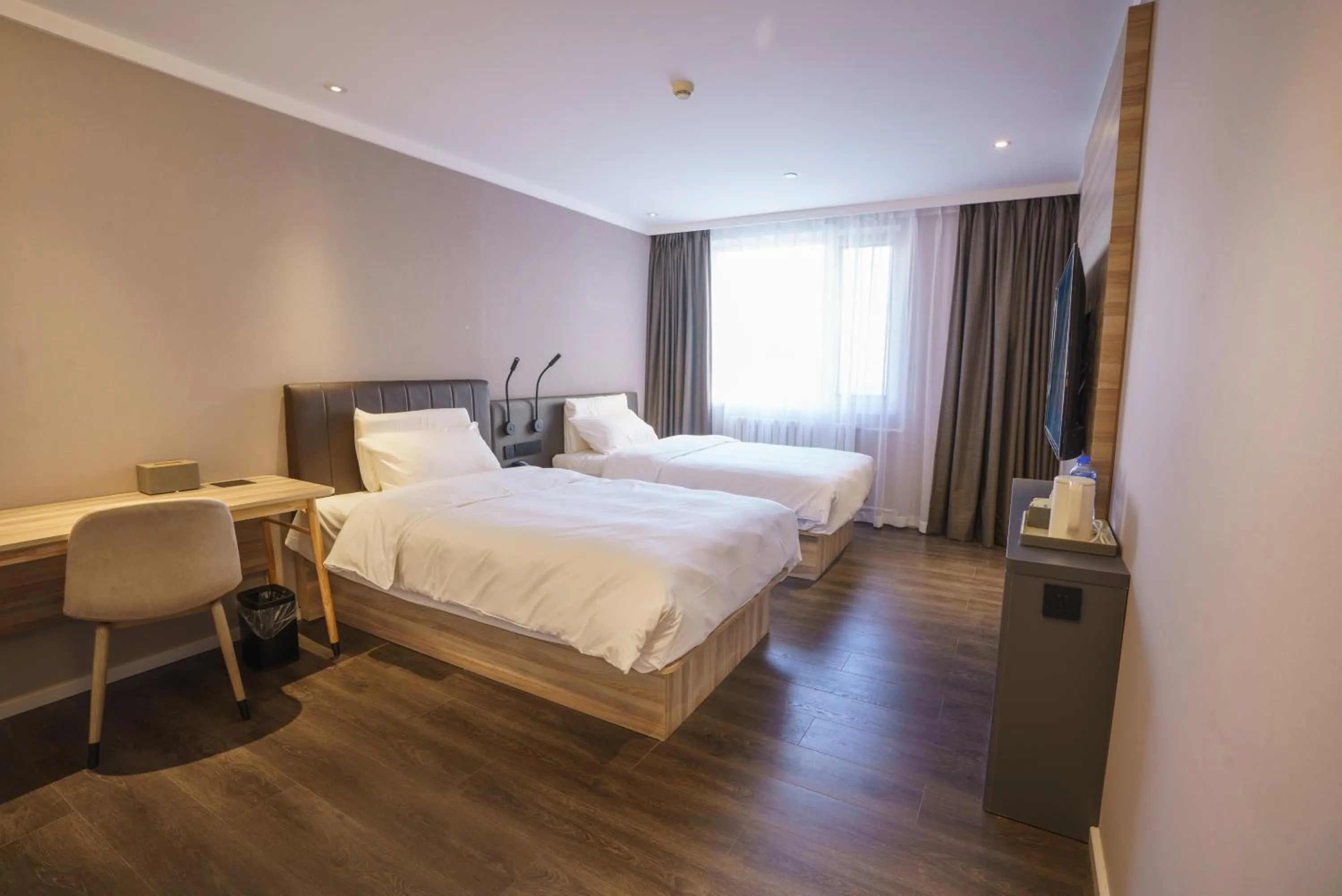 Bed in Hanting Hotel Beijing South Railway Station Muxiyuan