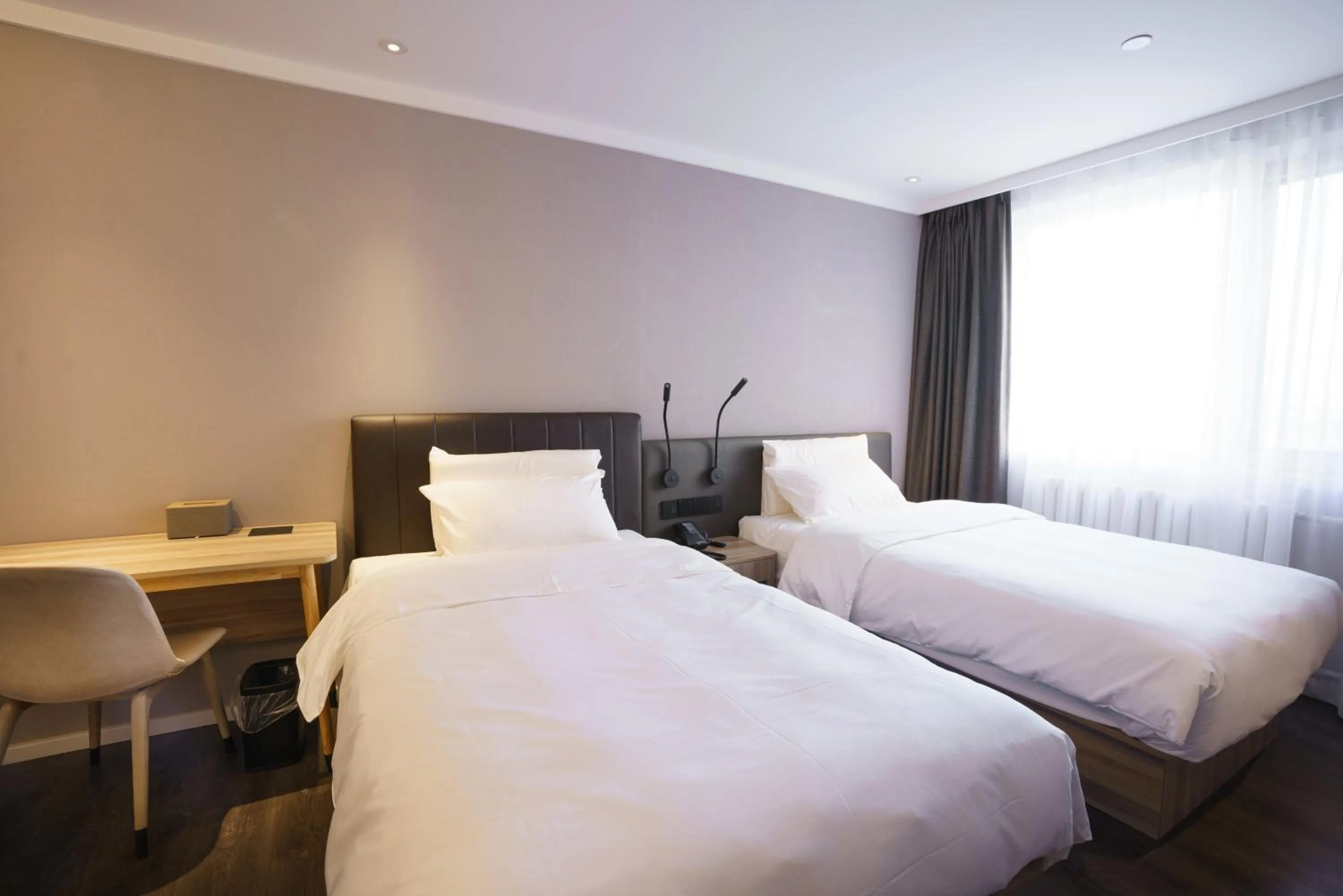Bed in Hanting Hotel Beijing South Railway Station Muxiyuan