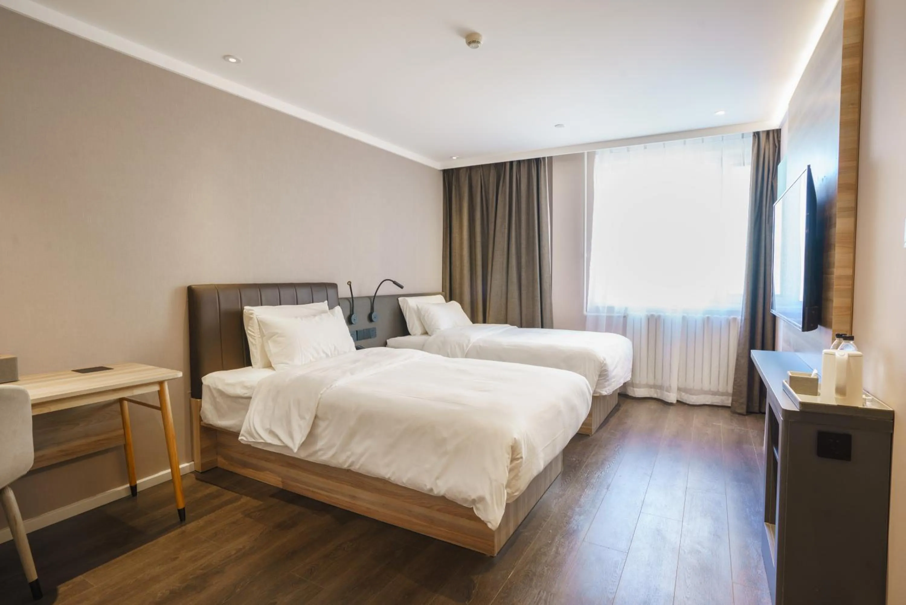 Bed in Hanting Hotel Beijing South Railway Station Muxiyuan