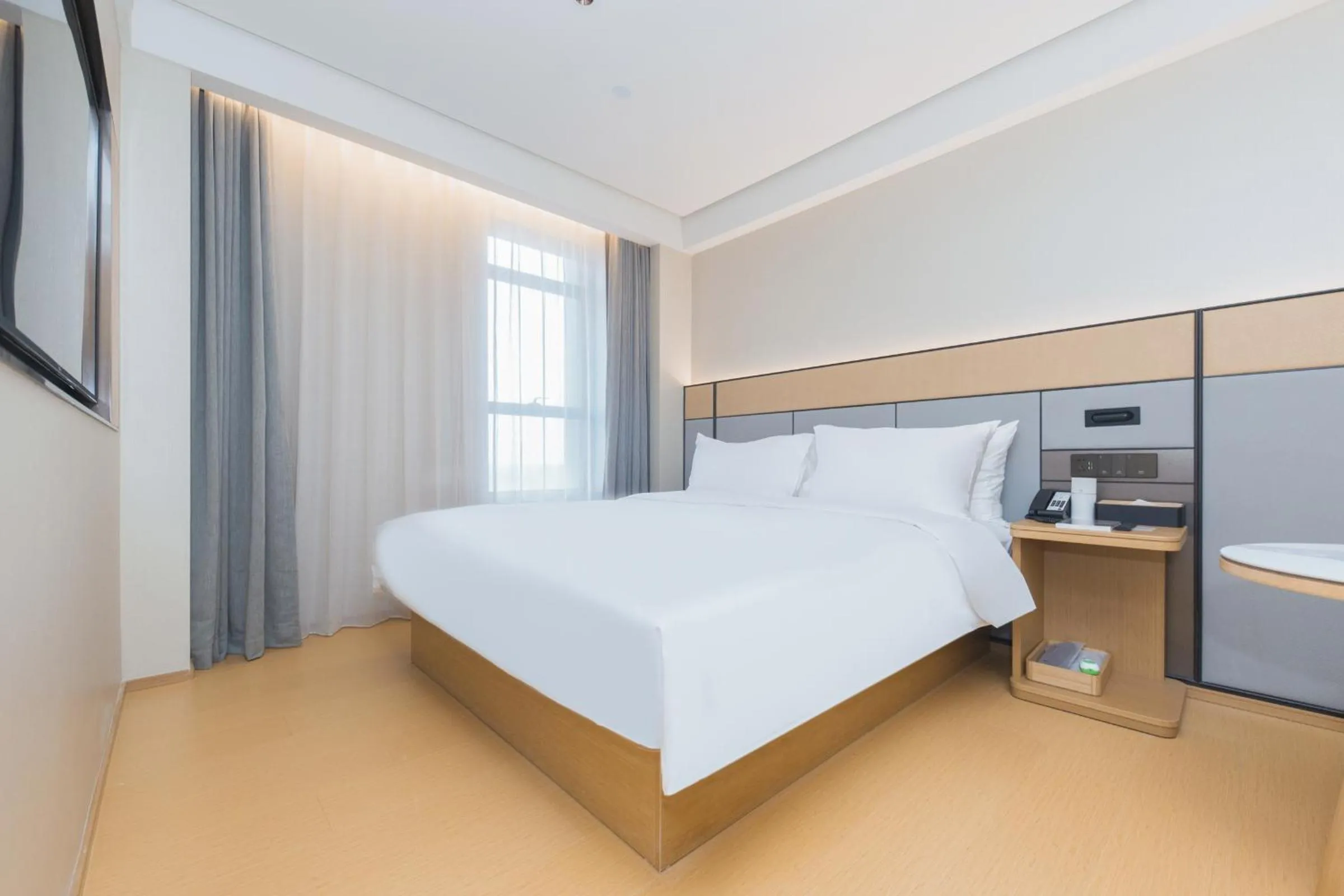 Bed in JI Hotel Hangzhou Linping Yintai City