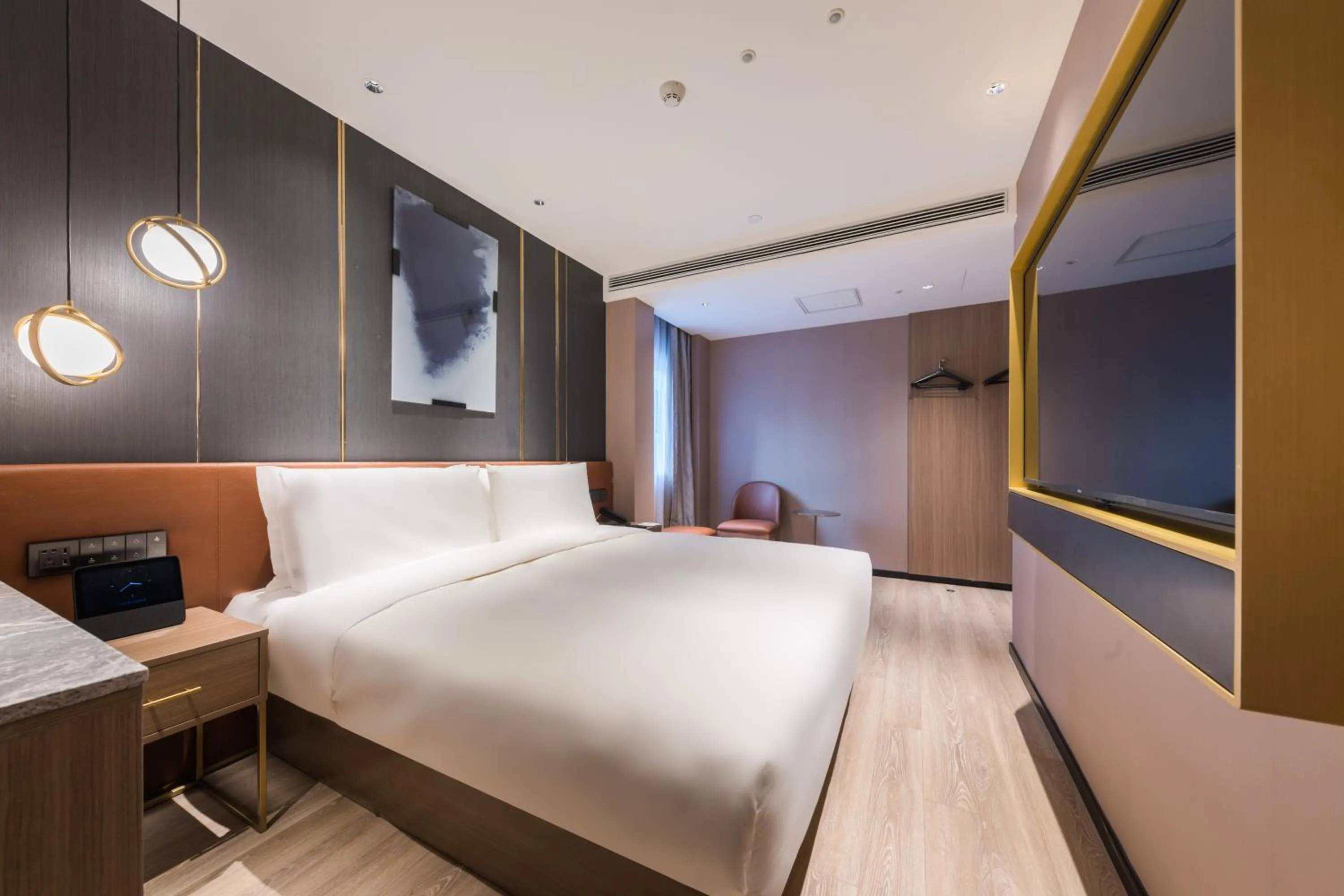 Bed in Orange Hotel Shanghai World Expo Center