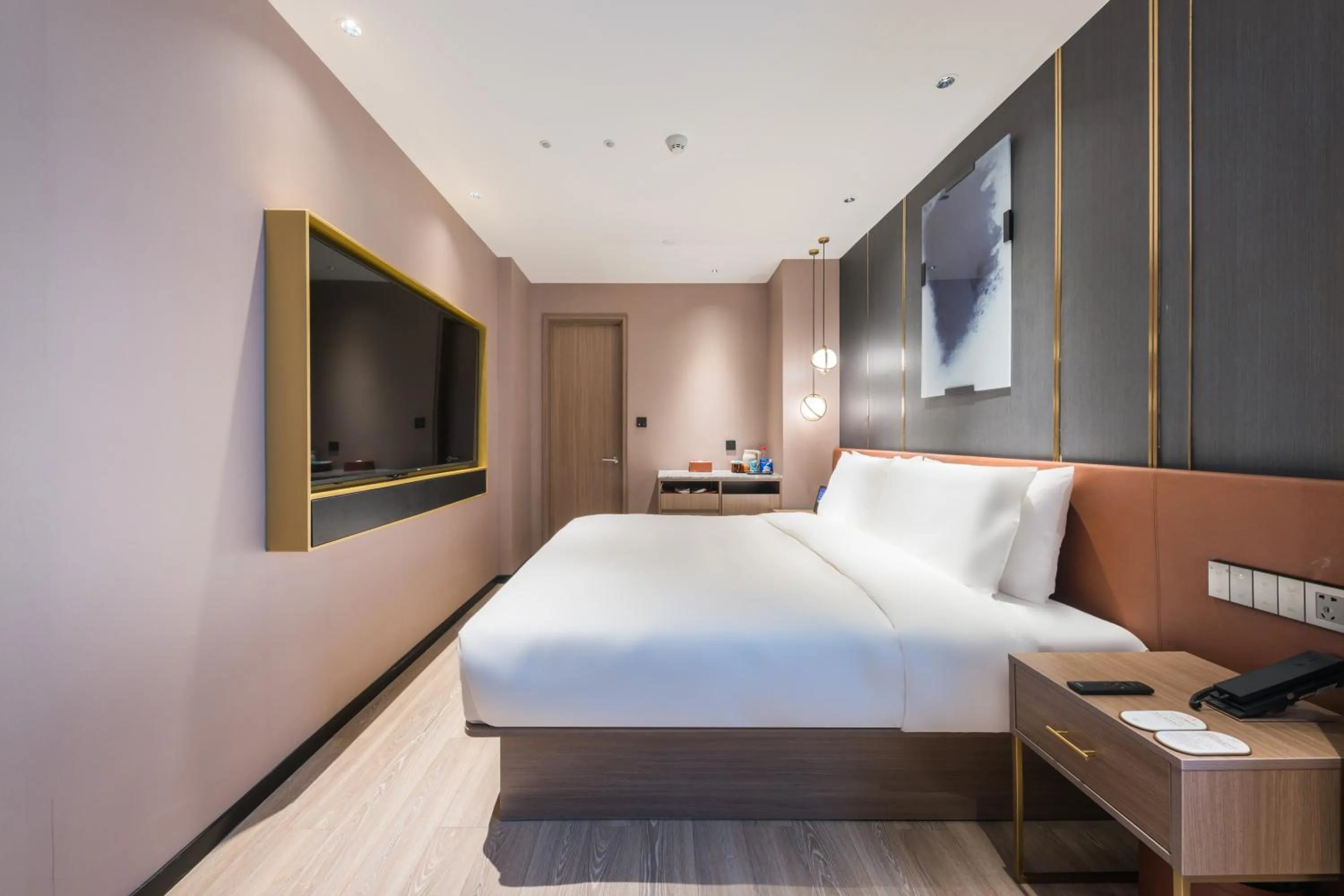 Bed in Orange Hotel Shanghai World Expo Center