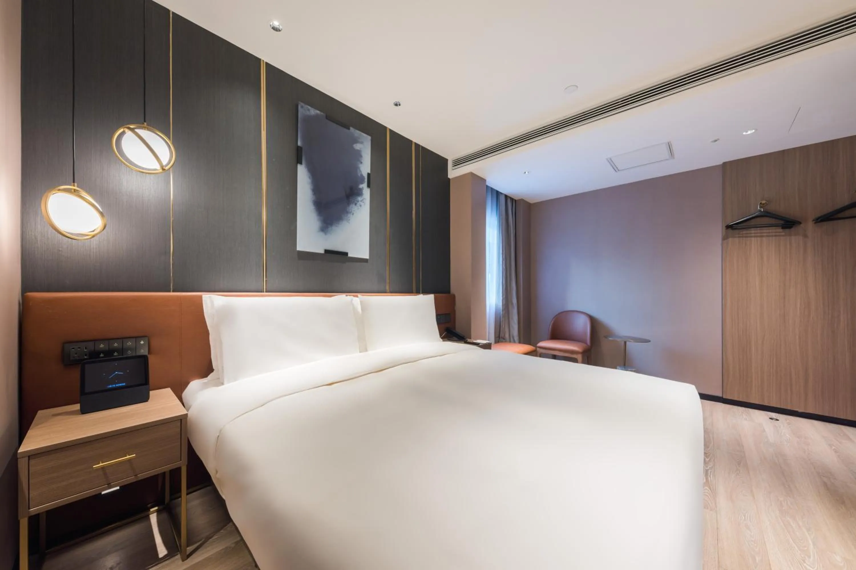 Bed in Orange Hotel Shanghai World Expo Center