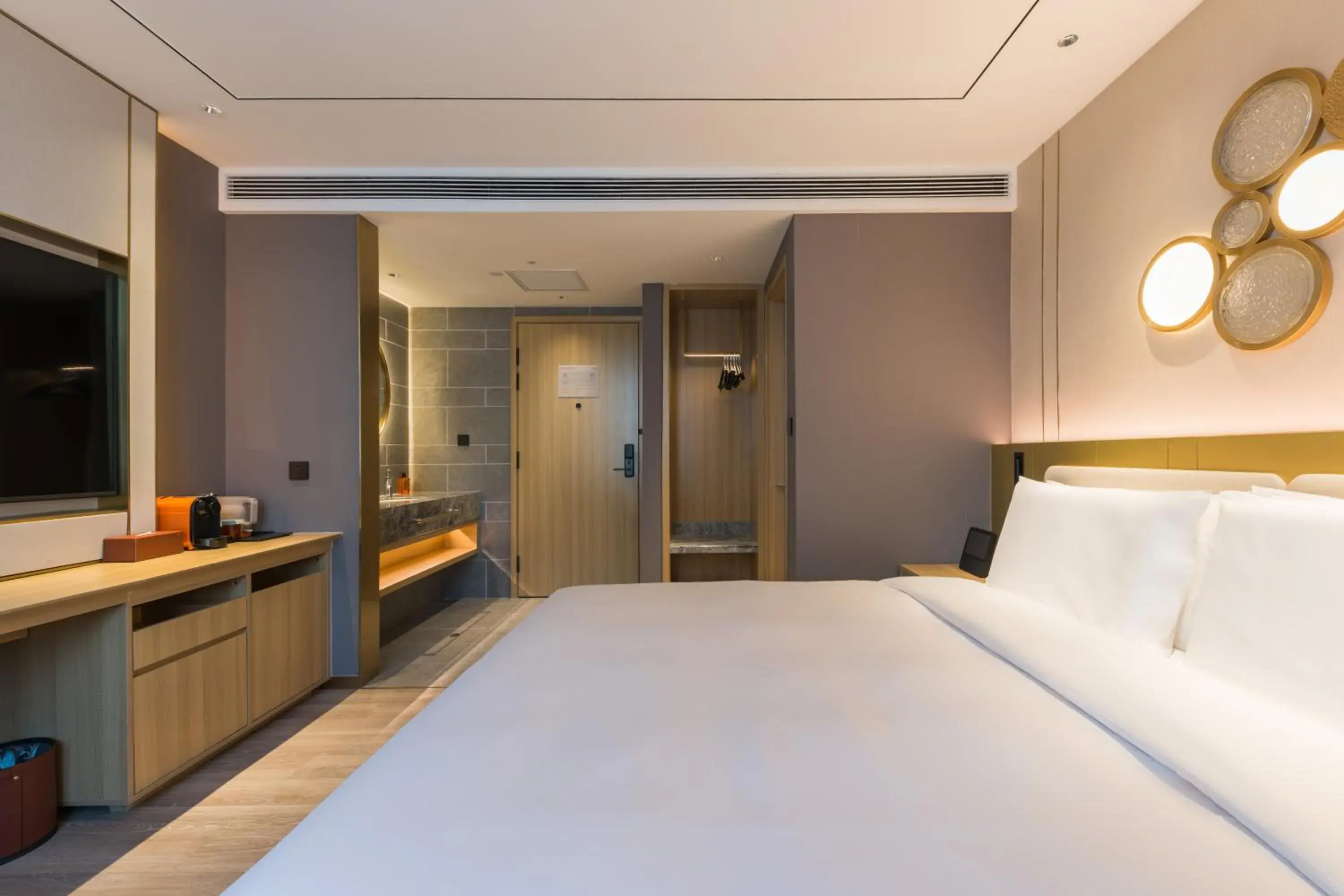 Bed in Orange Hotel Shanghai World Expo Center Bed in Orange Hotel Shanghai World Expo Center