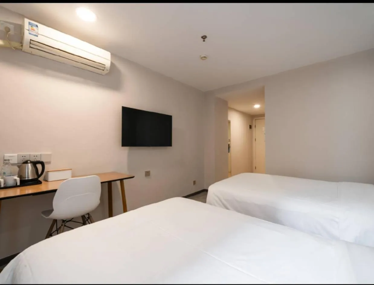 Bed in Hanting Hotel Shenzhen Taian Subway Station