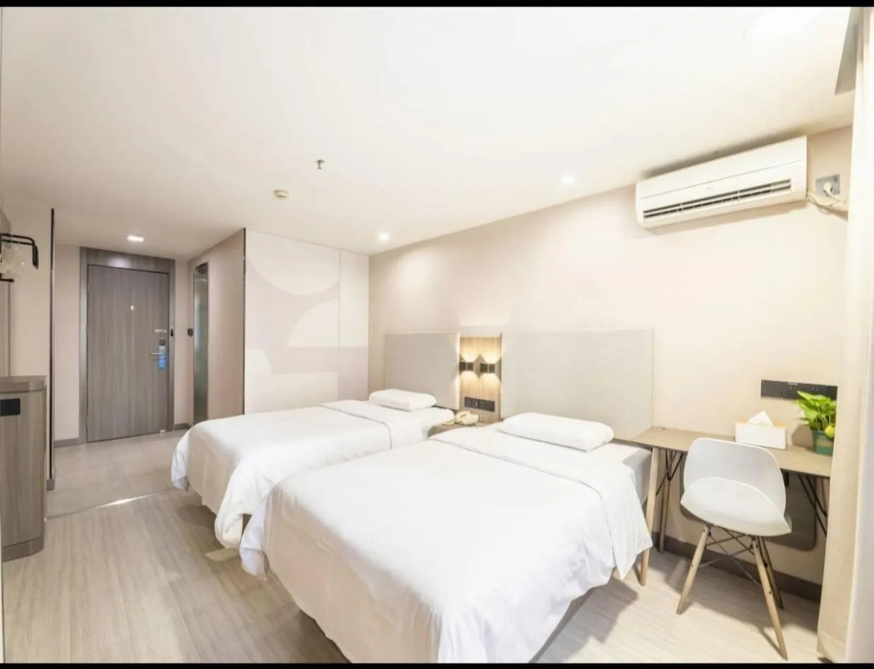 Bed in Hanting Hotel Shenzhen Taian Subway Station