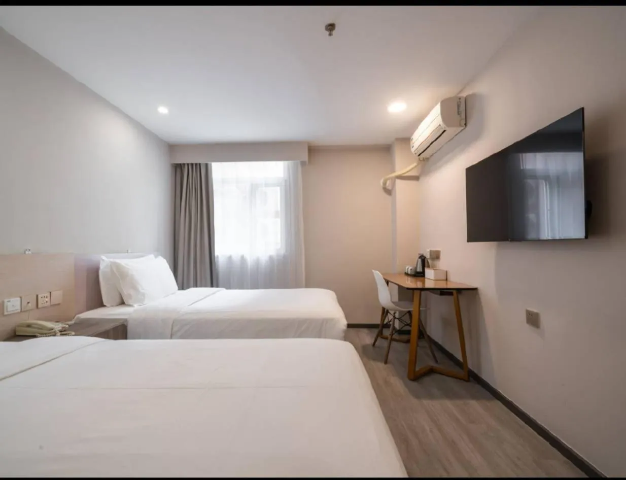 Bed in Hanting Hotel Shenzhen Taian Subway Station