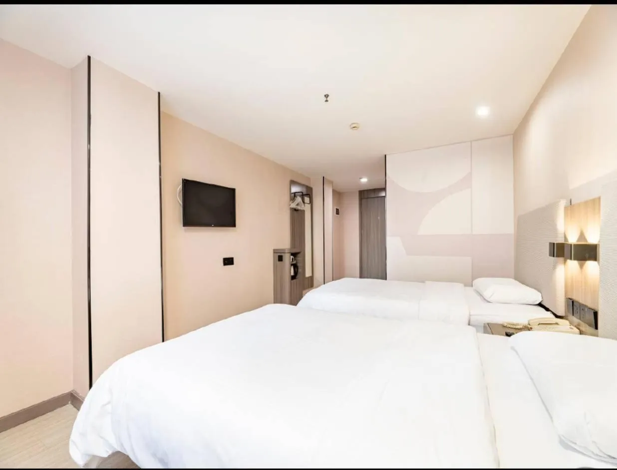 Bed in Hanting Hotel Shenzhen Taian Subway Station