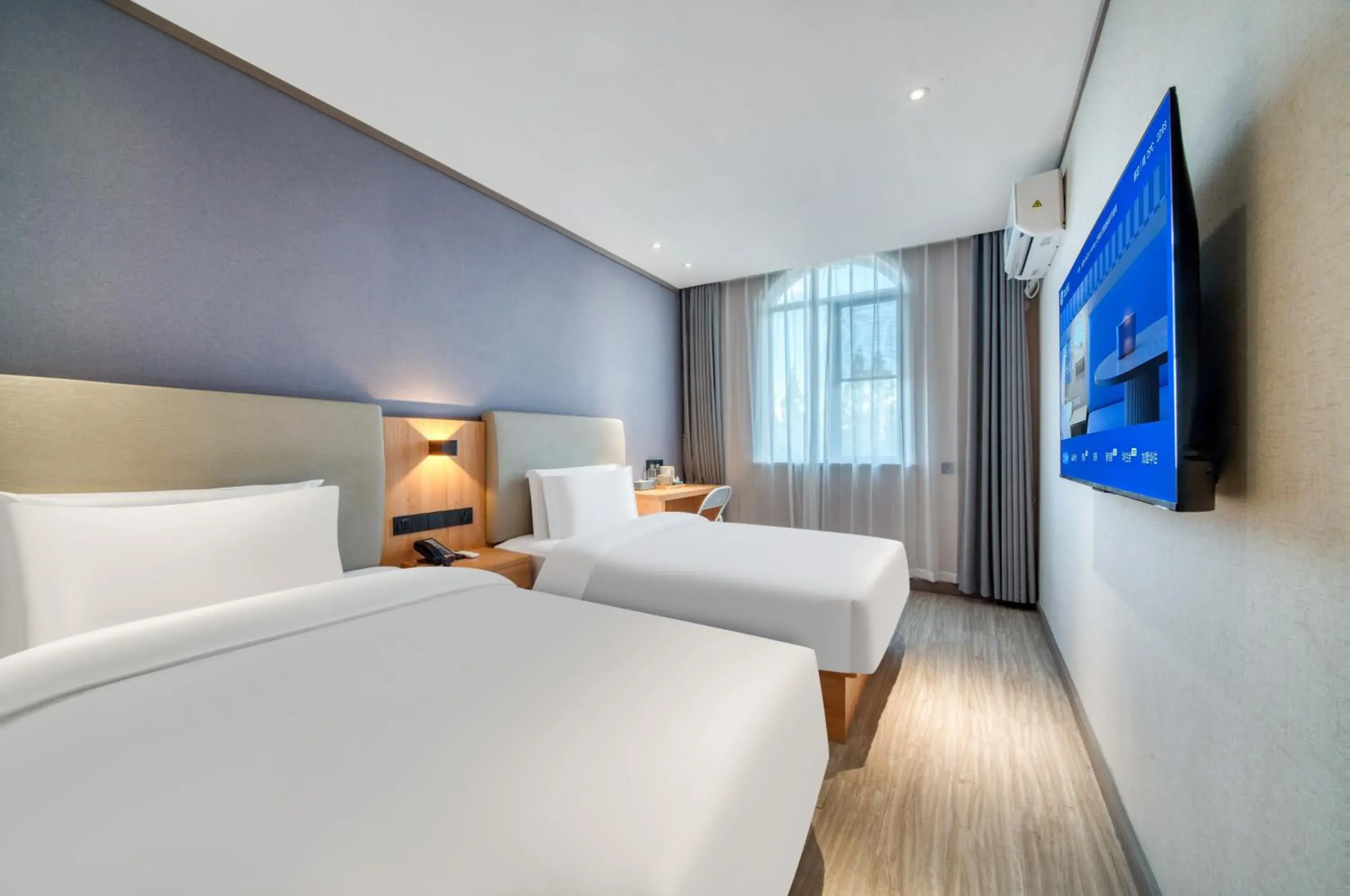 Twin Room in Hanting Hotel Shanghai Jiading Waigang Business School Twin Room in Hanting Hotel Shanghai Jiading Waigang Business School