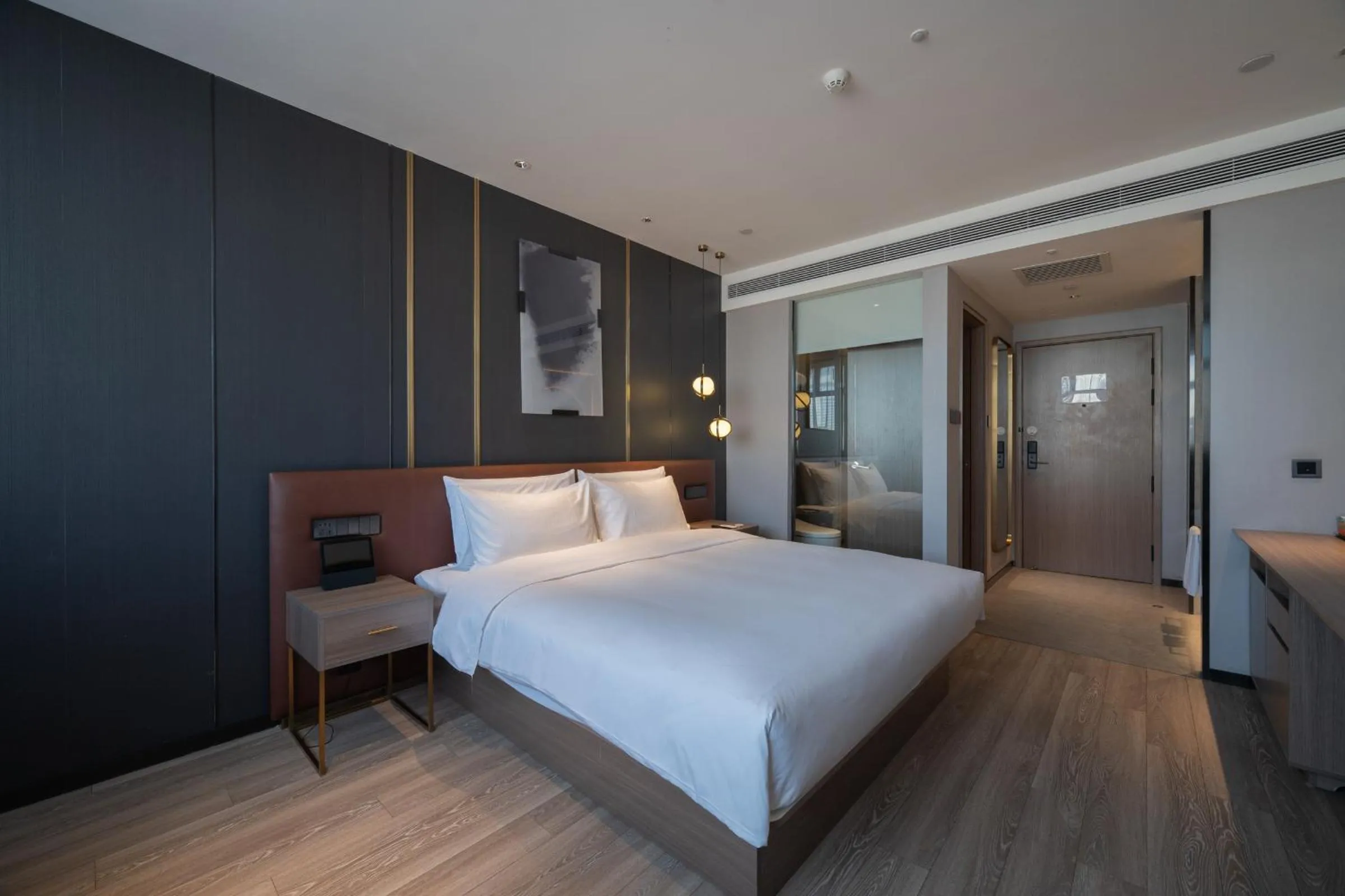 Bed in Orange Hotel Beijing West Railway Station Lianbao Road