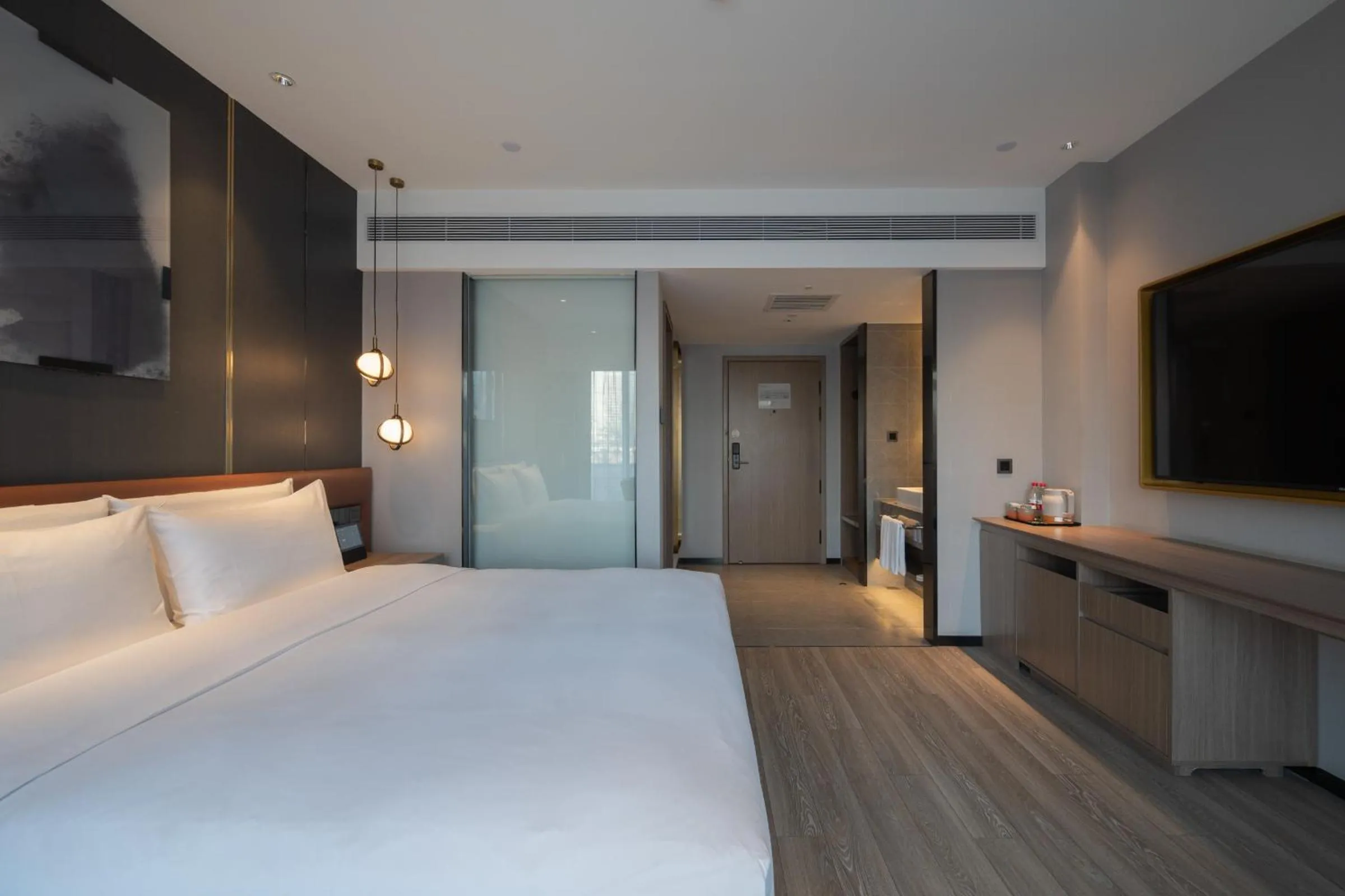 Bed in Orange Hotel Beijing West Railway Station Lianbao Road