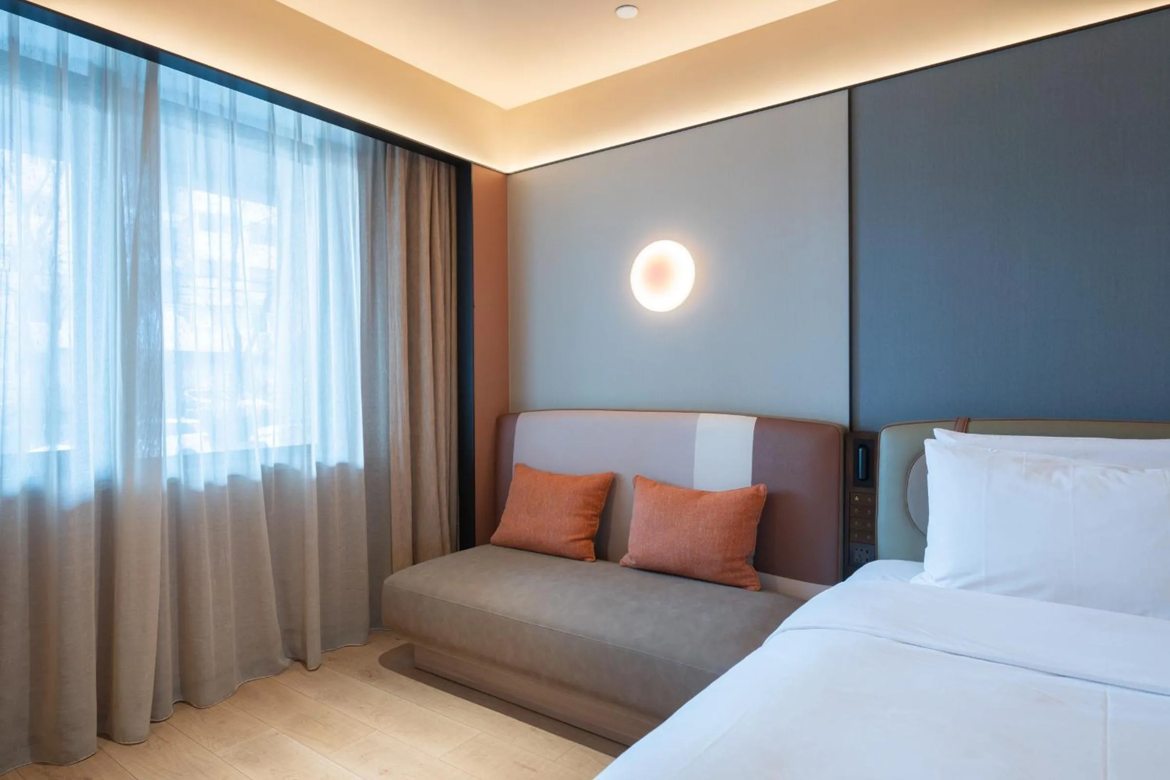 Bed in Orange Hotel Beijing West Railway Station Lianbao Road