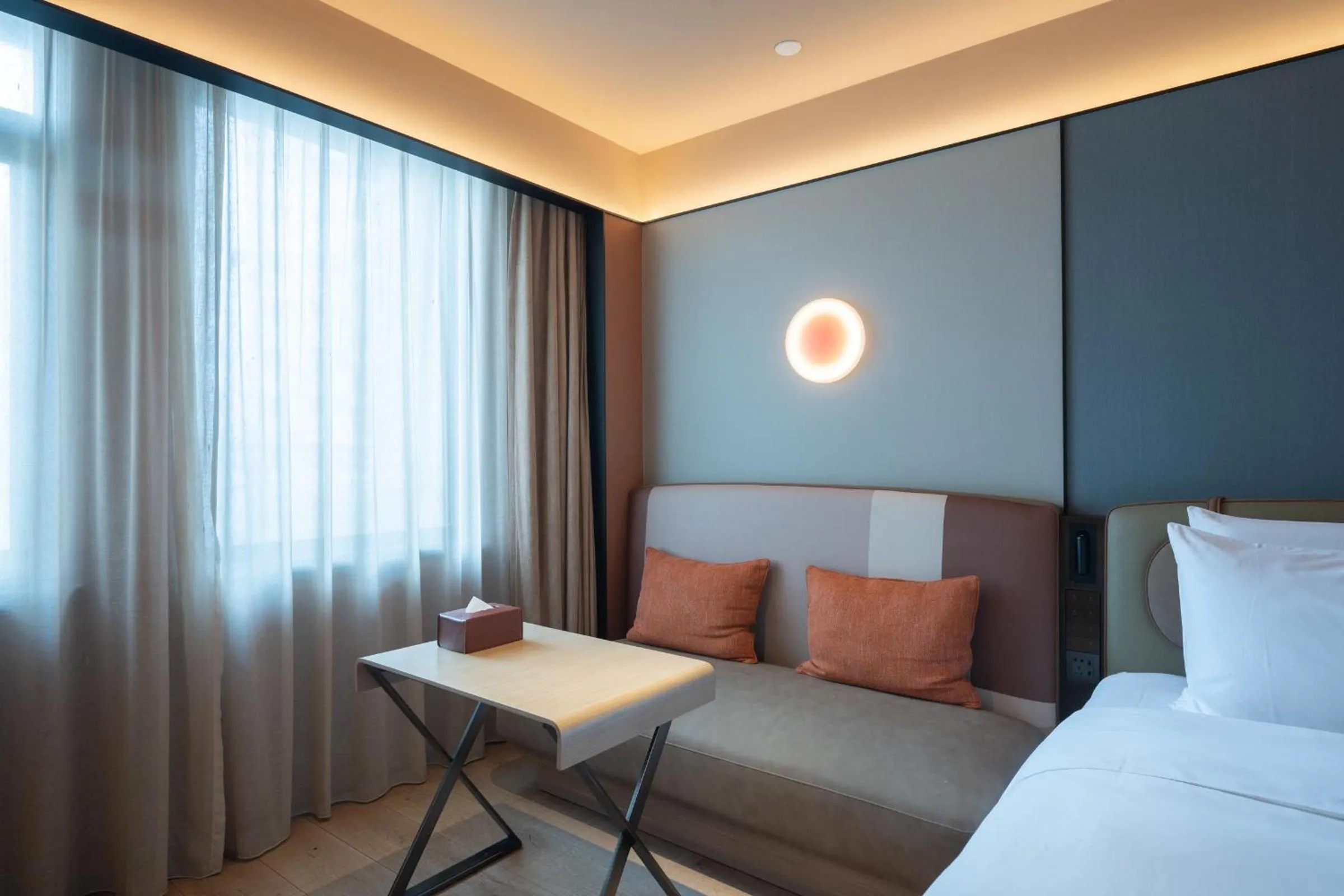 Bed in Orange Hotel Beijing West Railway Station Lianbao Road