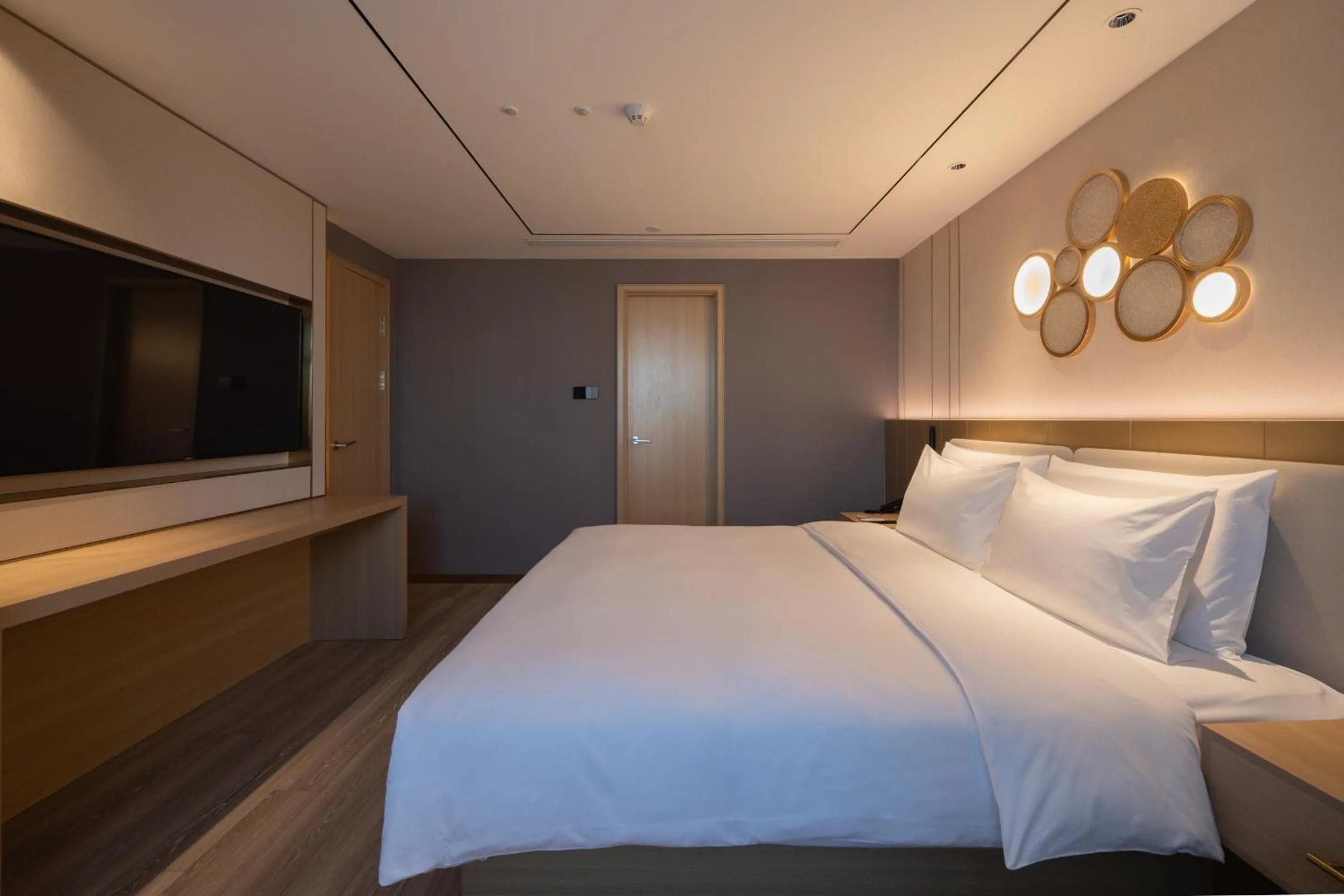 Bed in Orange Hotel Beijing West Railway Station Lianbao Road