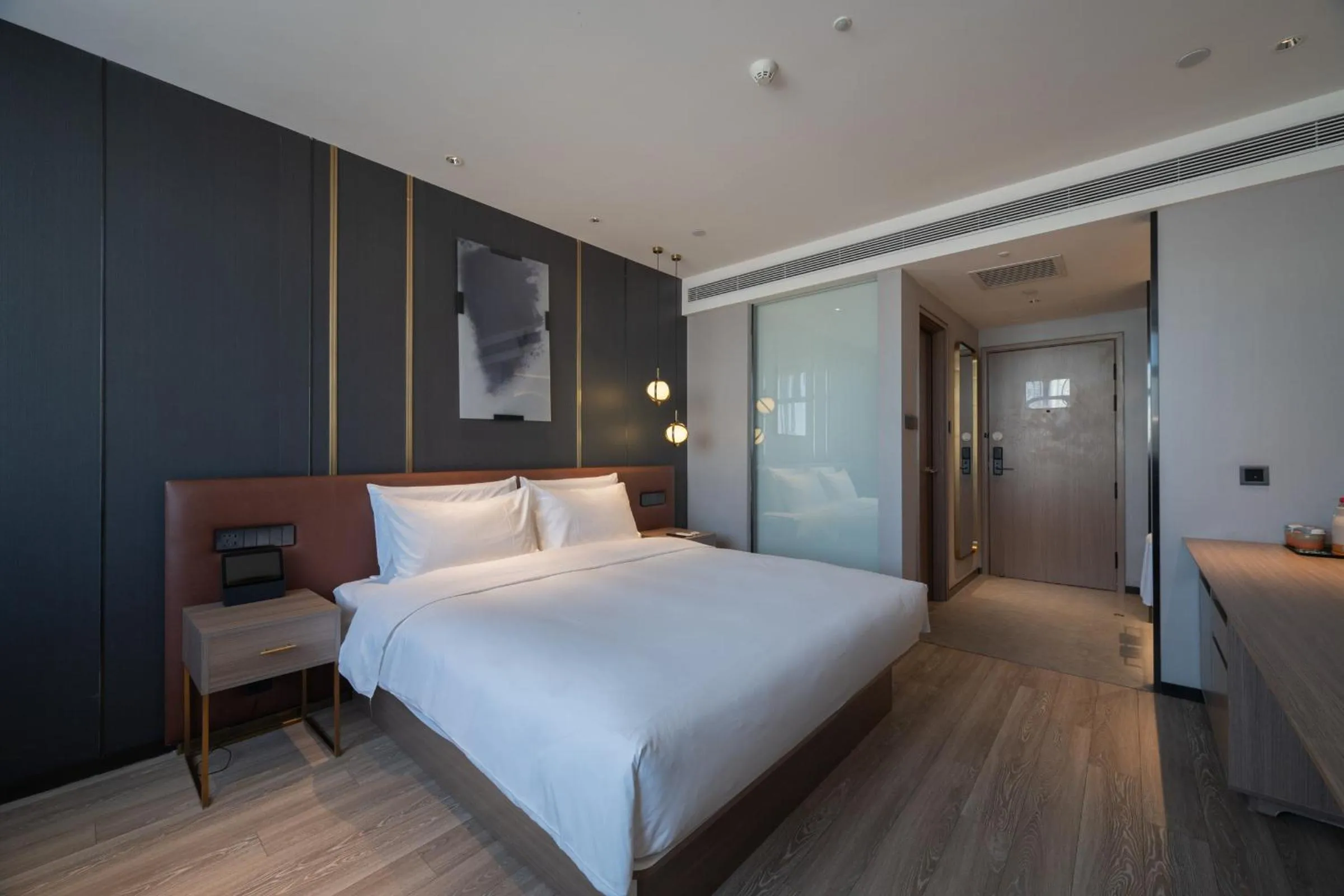 Bed in Orange Hotel Beijing West Railway Station Lianbao Road