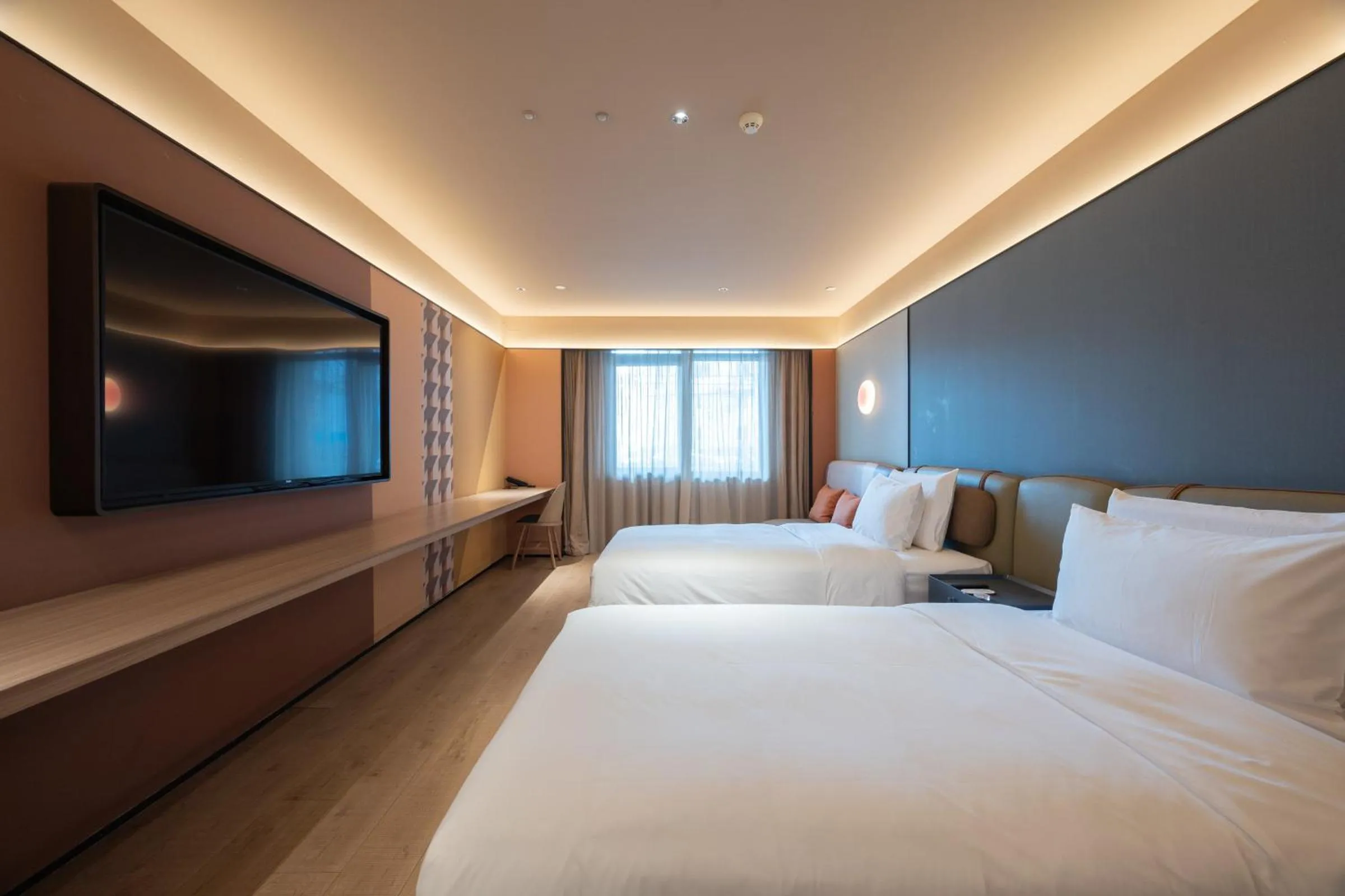 Bed in Orange Hotel Beijing West Railway Station Lianbao Road