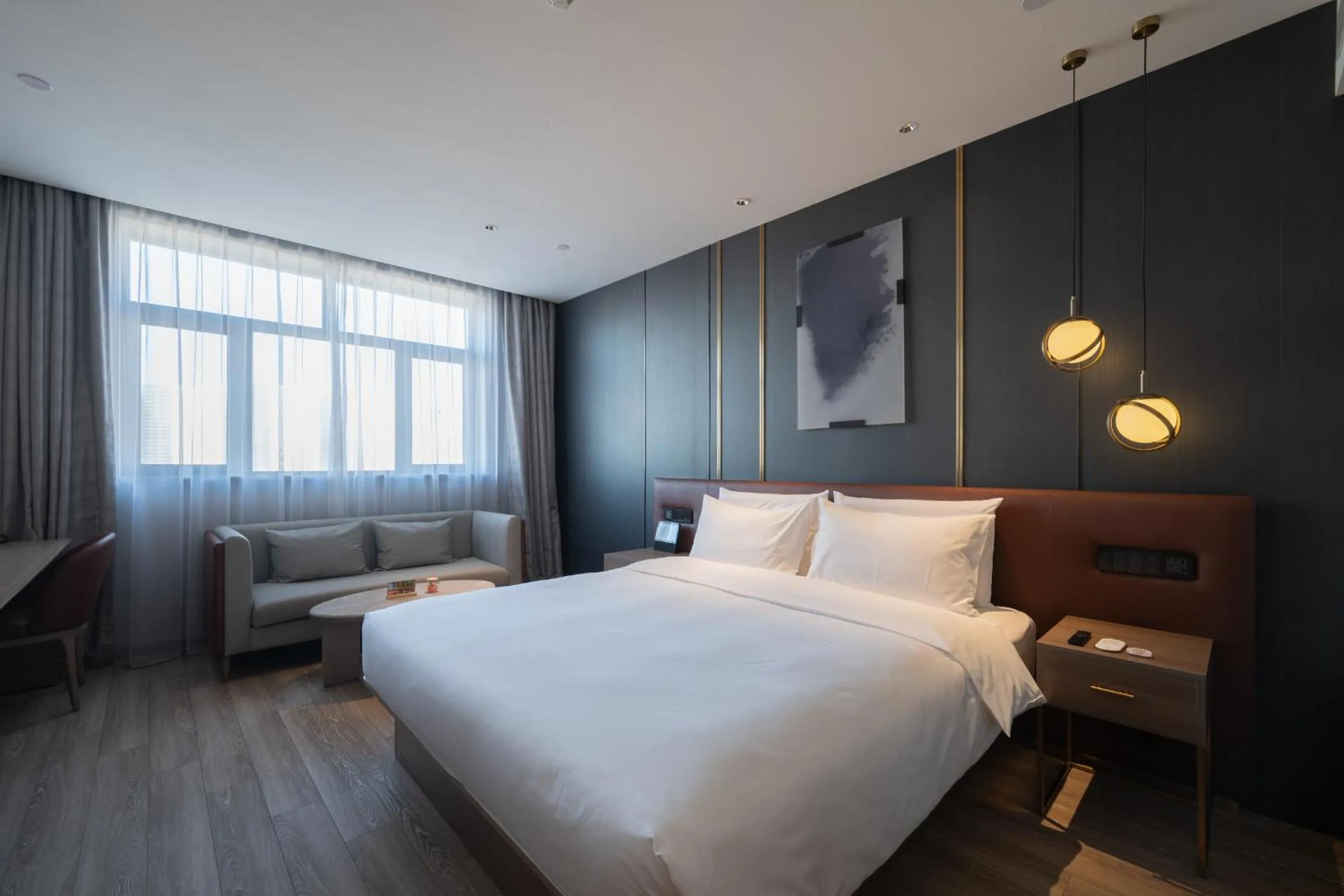 Bed in Orange Hotel Beijing West Railway Station Lianbao Road