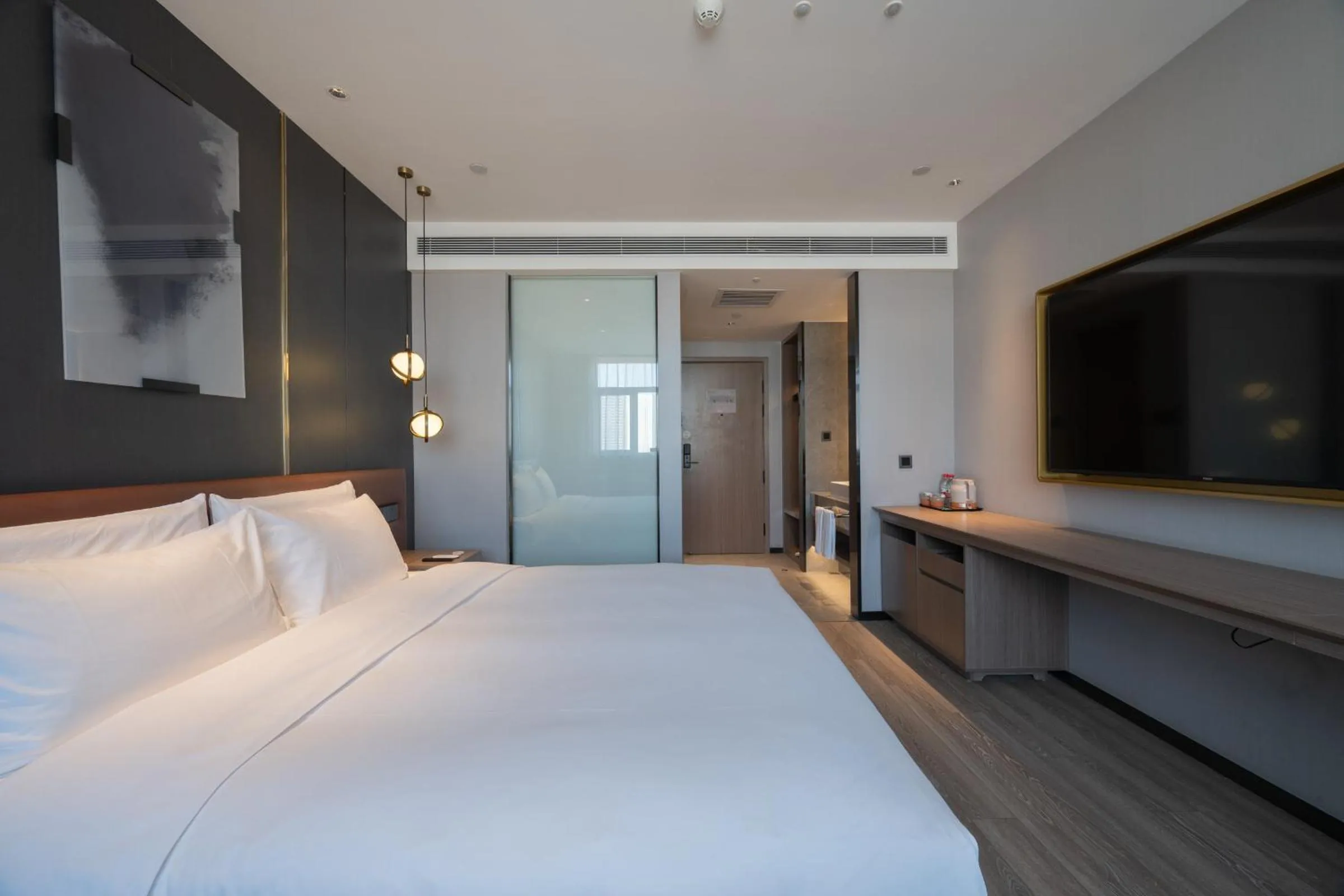 Bed in Orange Hotel Beijing West Railway Station Lianbao Road