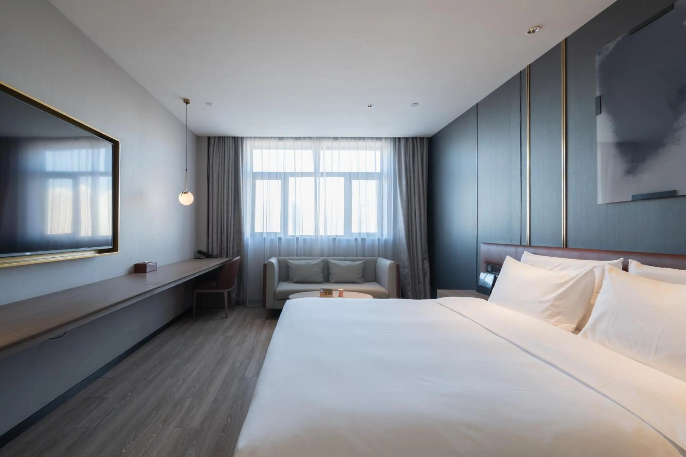 Bed in Orange Hotel Beijing West Railway Station Lianbao Road