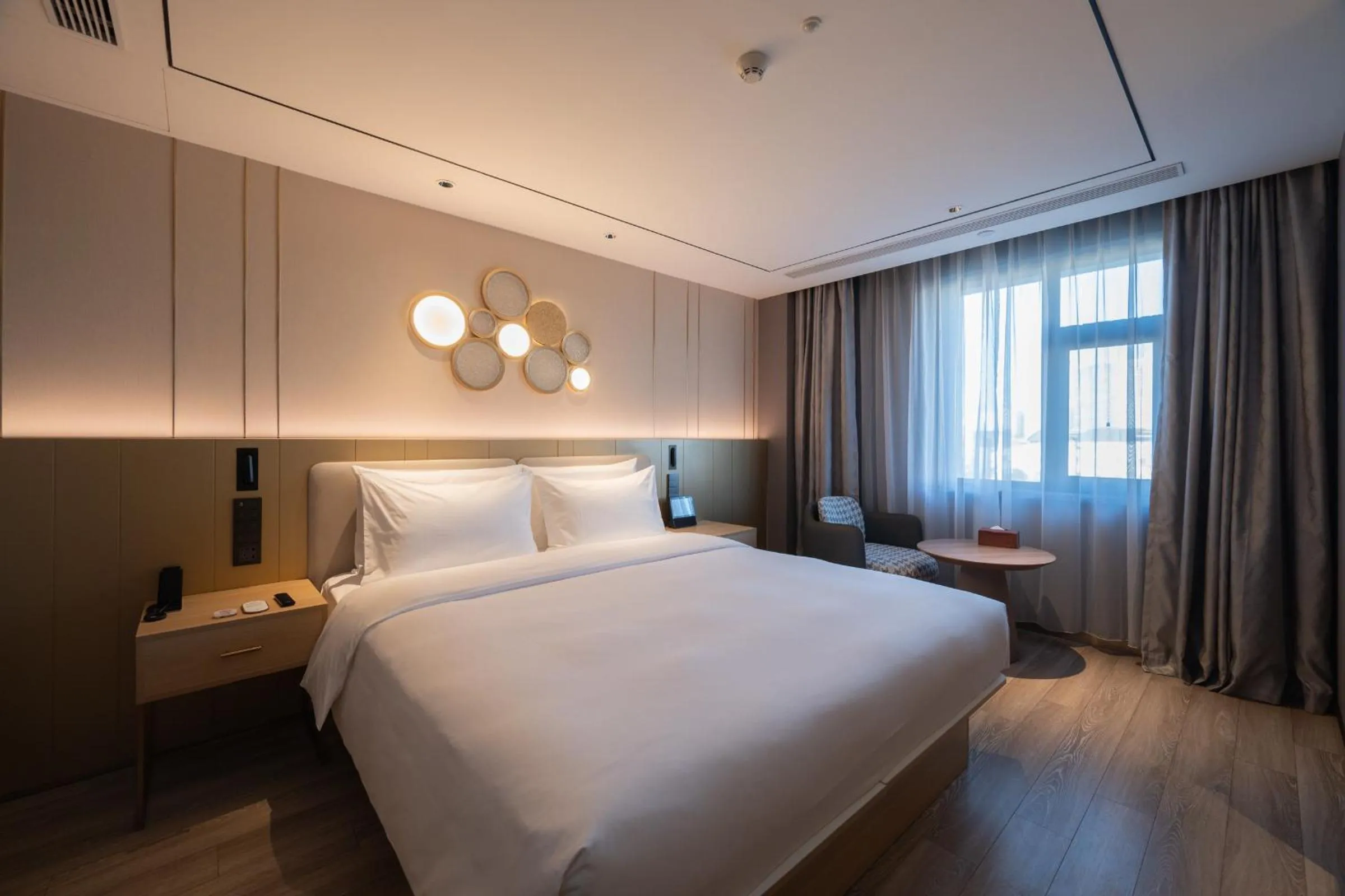 Bed in Orange Hotel Beijing West Railway Station Lianbao Road