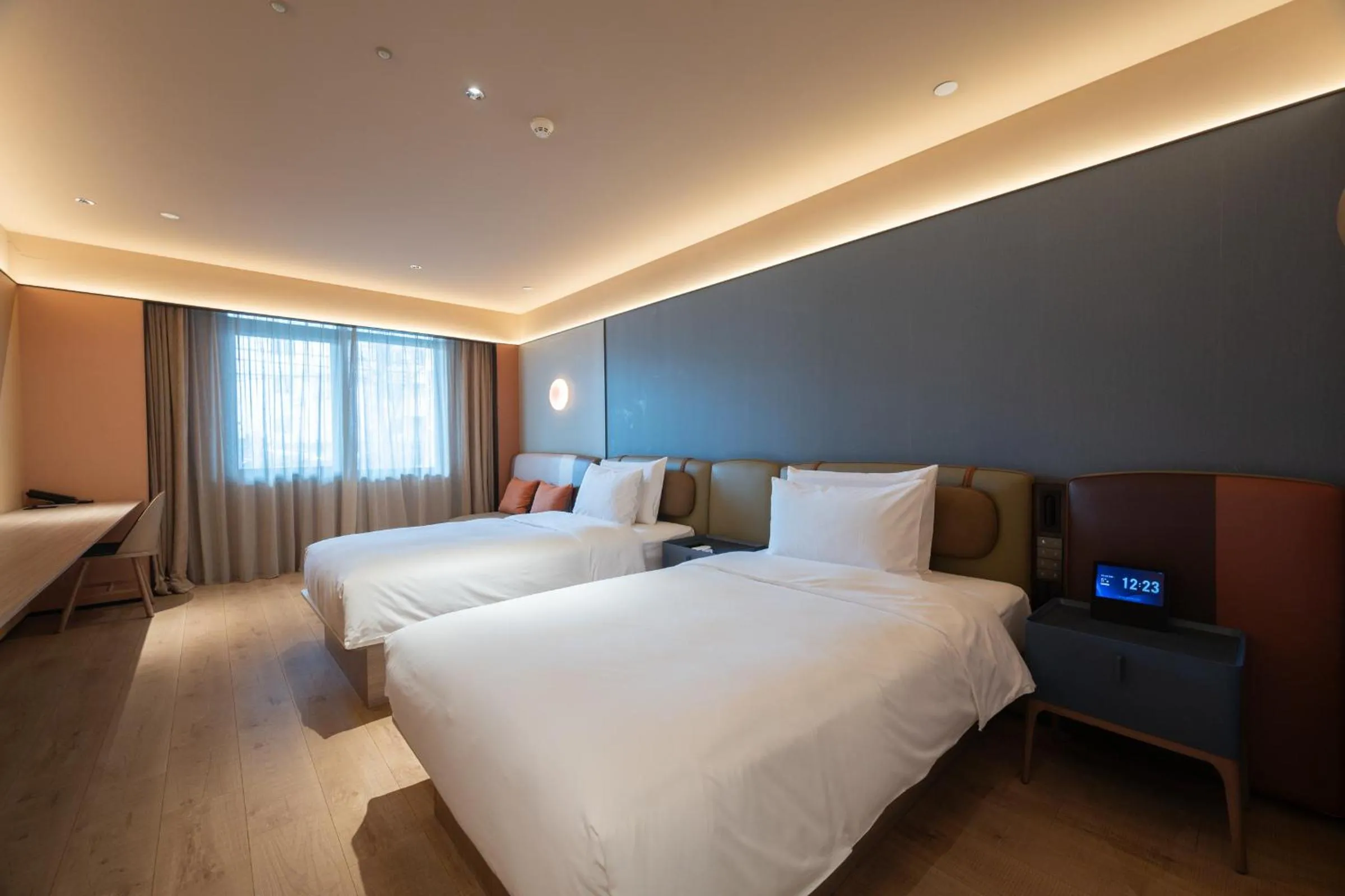 Bed in Orange Hotel Beijing West Railway Station Lianbao Road