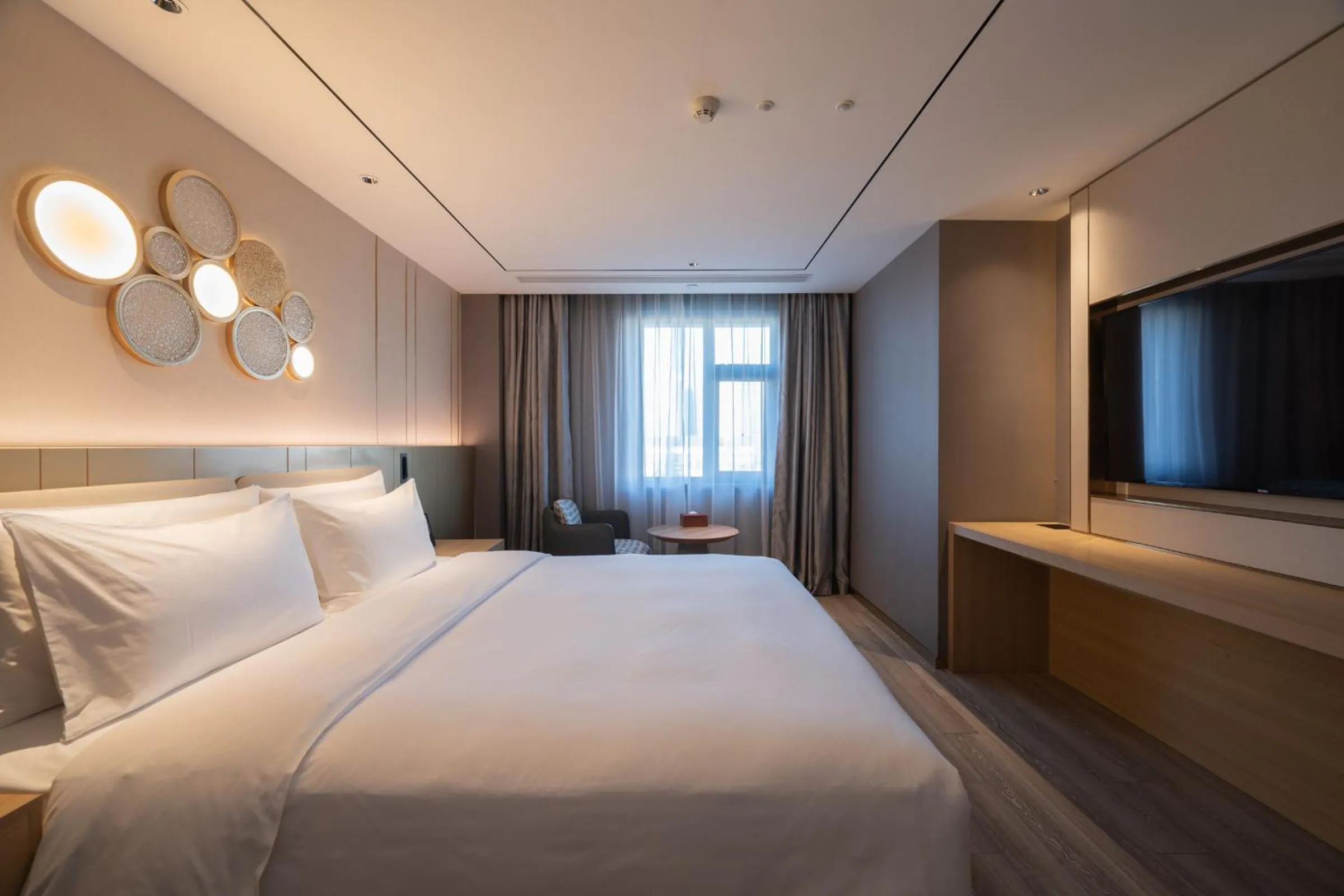 Bed in Orange Hotel Beijing West Railway Station Lianbao Road