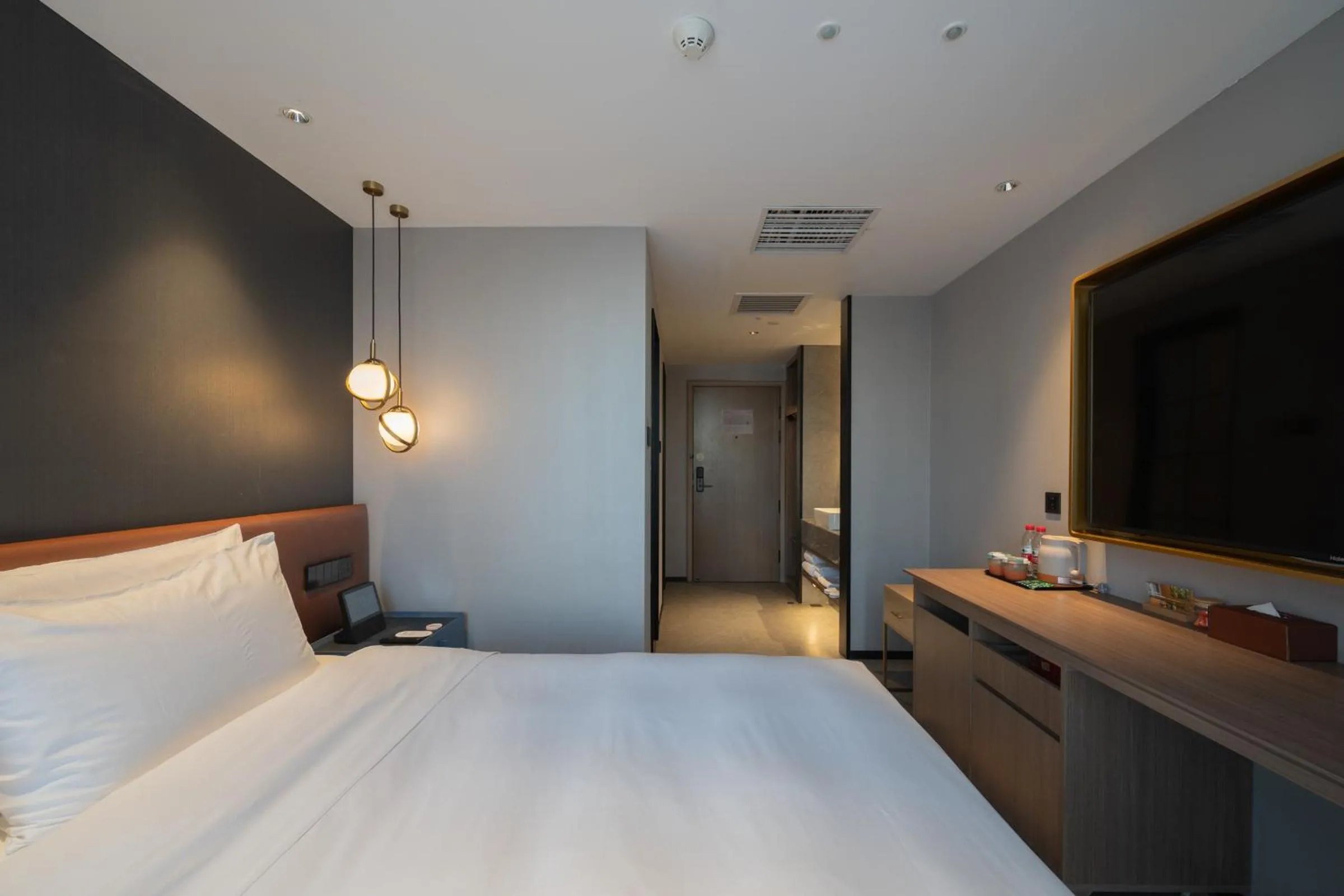 Bed in Orange Hotel Beijing West Railway Station Lianbao Road