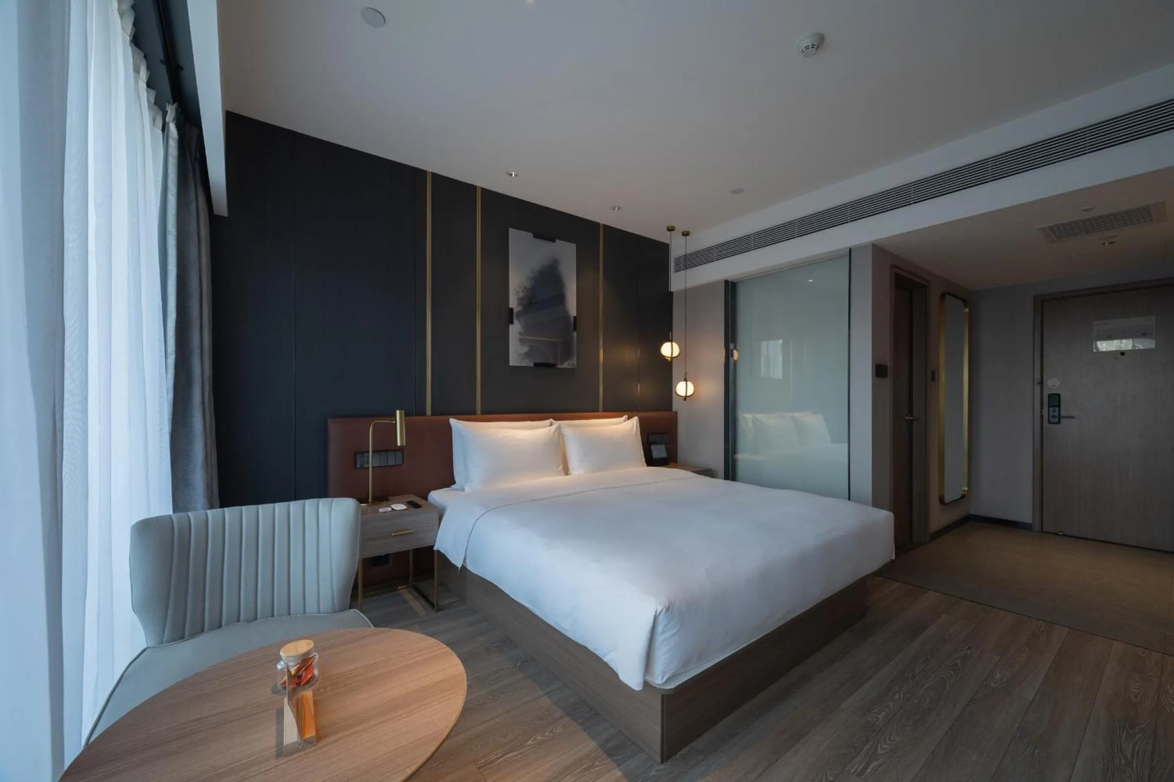 Bed in Orange Hotel Beijing West Railway Station Lianbao Road