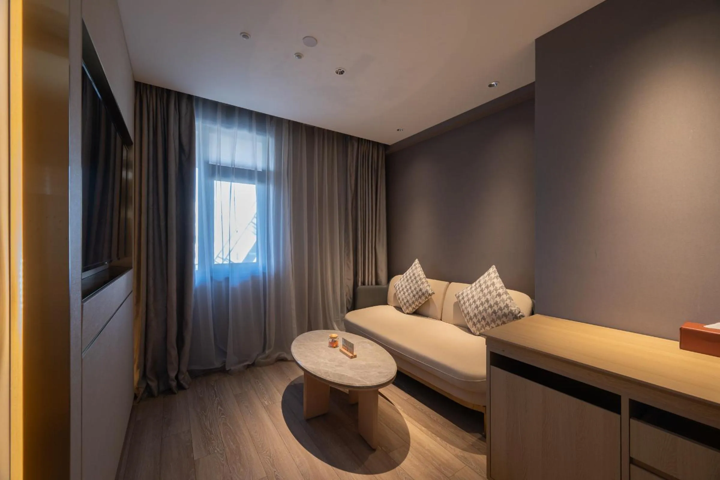 Bed in Orange Hotel Beijing West Railway Station Lianbao Road