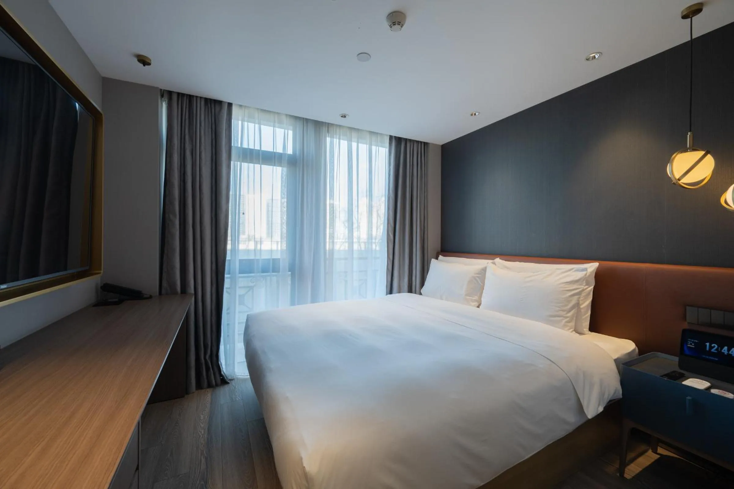 Bed in Orange Hotel Beijing West Railway Station Lianbao Road