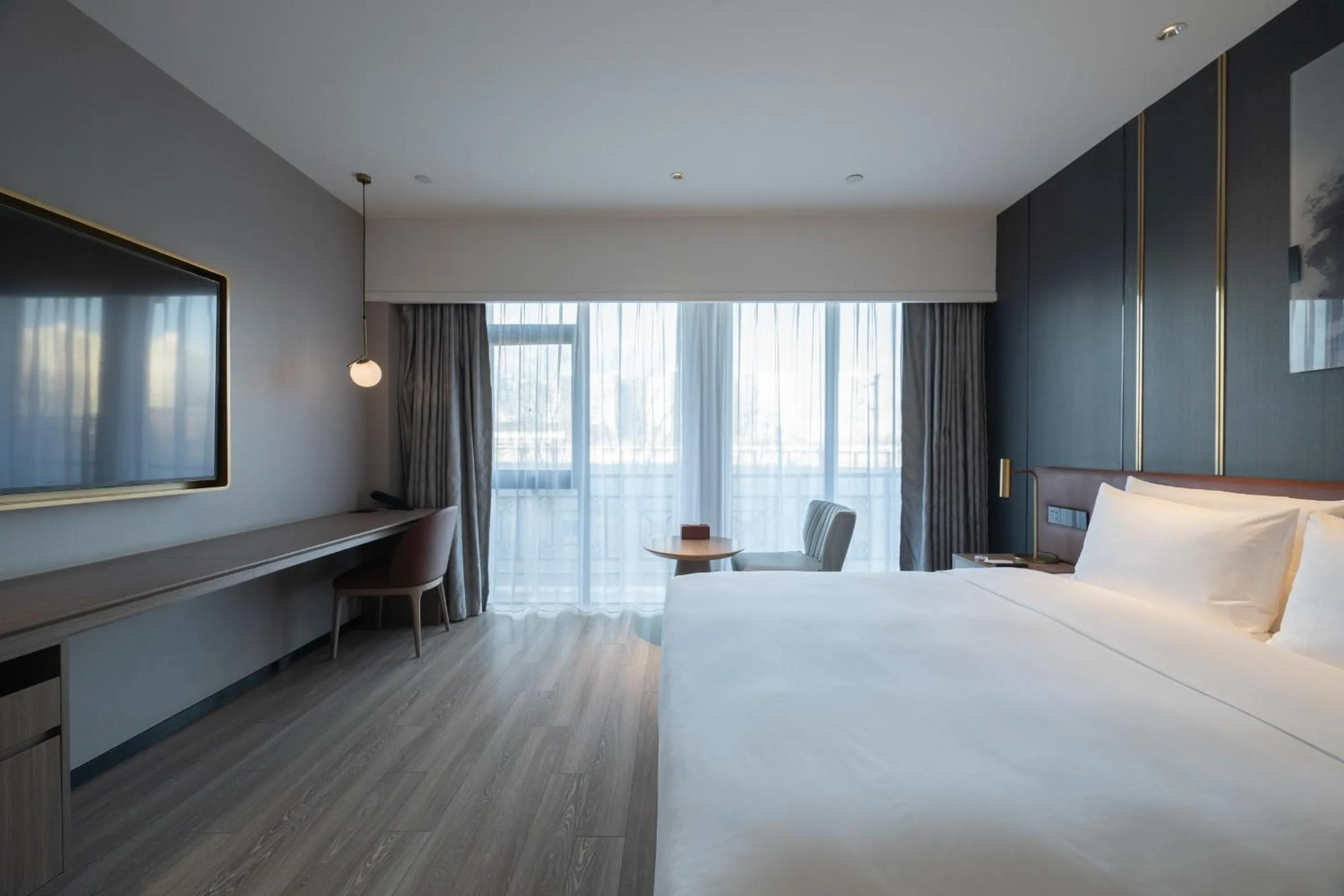 Bed in Orange Hotel Beijing West Railway Station Lianbao Road