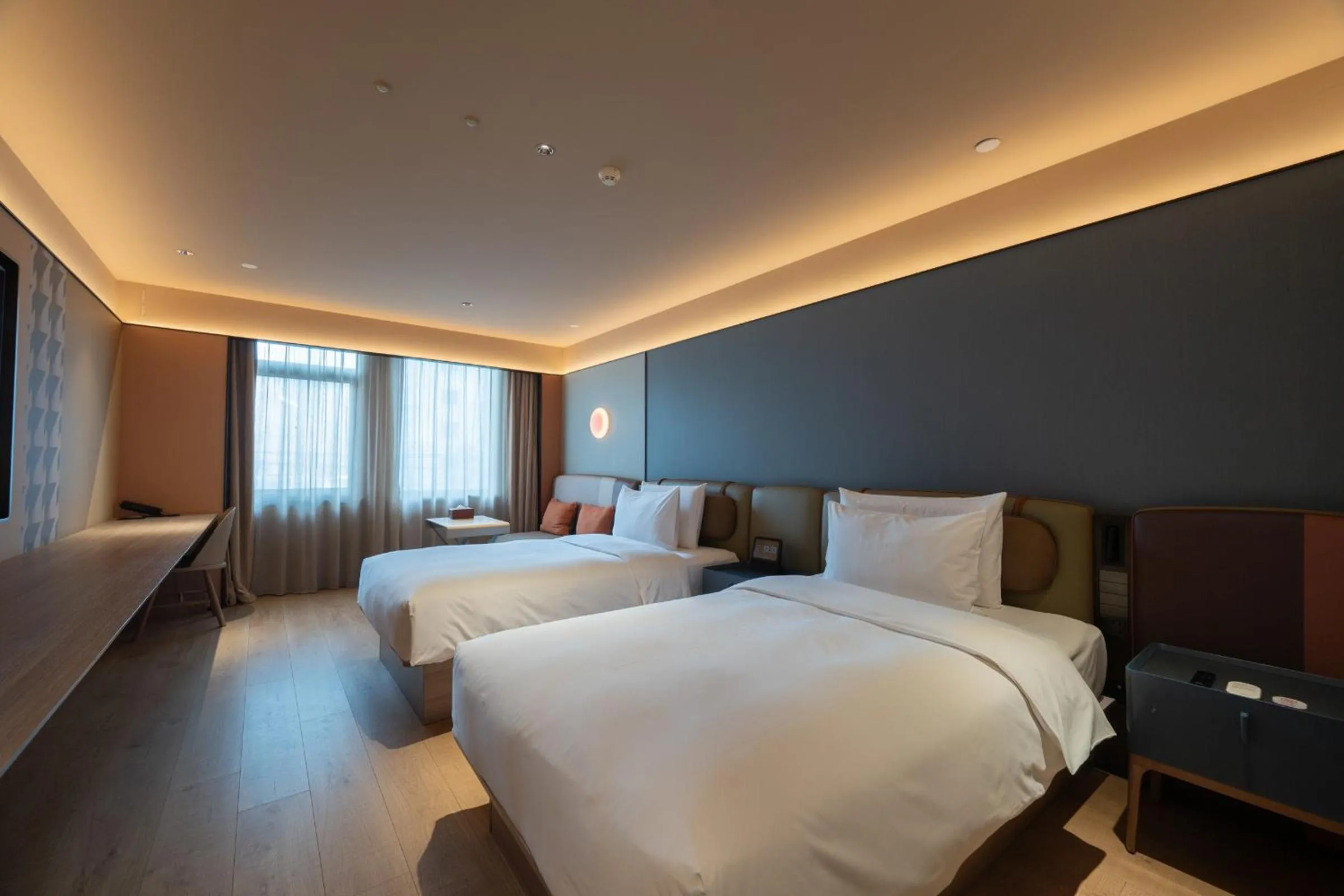 Bed in Orange Hotel Beijing West Railway Station Lianbao Road