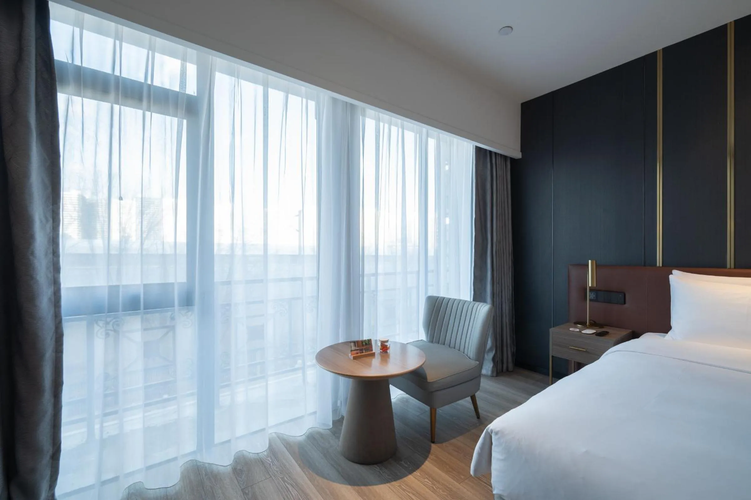 Bed in Orange Hotel Beijing West Railway Station Lianbao Road