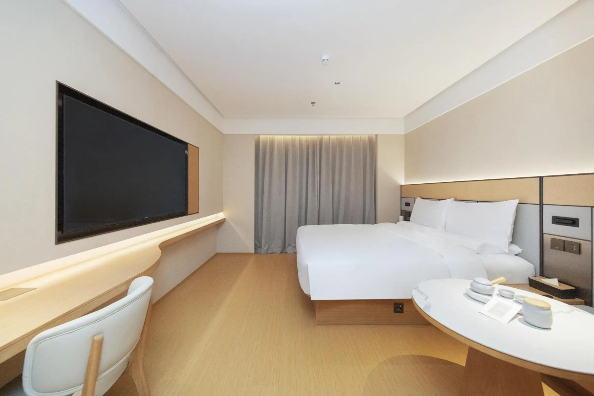 Bed in JI Hotel Shenzhen Convention & Exhibition Center Gangxia Subway Station