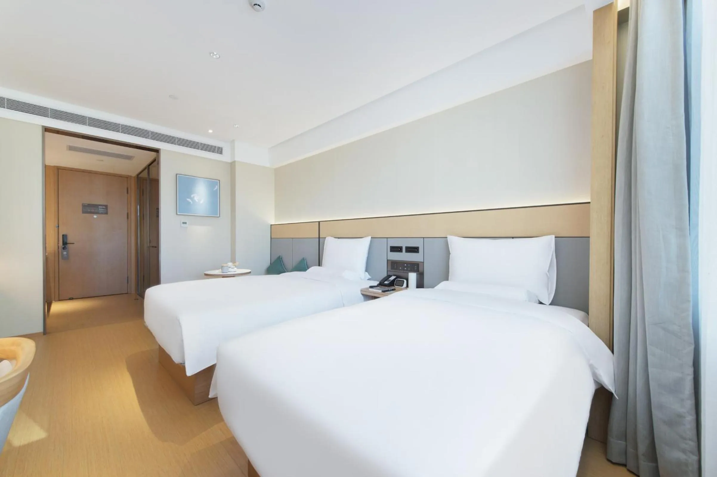 Bed in JI Hotel Shenzhen Convention & Exhibition Center Gangxia Subway Station