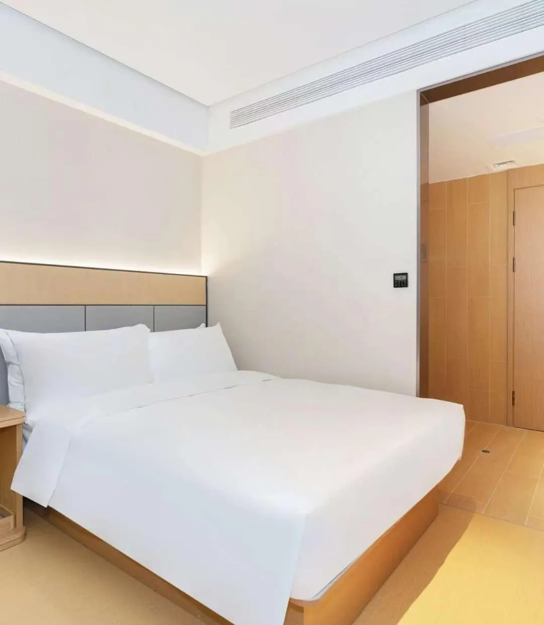 Bed in JI Hotel Guangzhou Fangcun Huadiwan