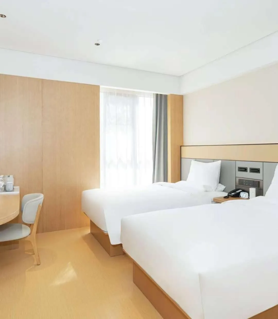 Bed in JI Hotel Guangzhou Fangcun Huadiwan