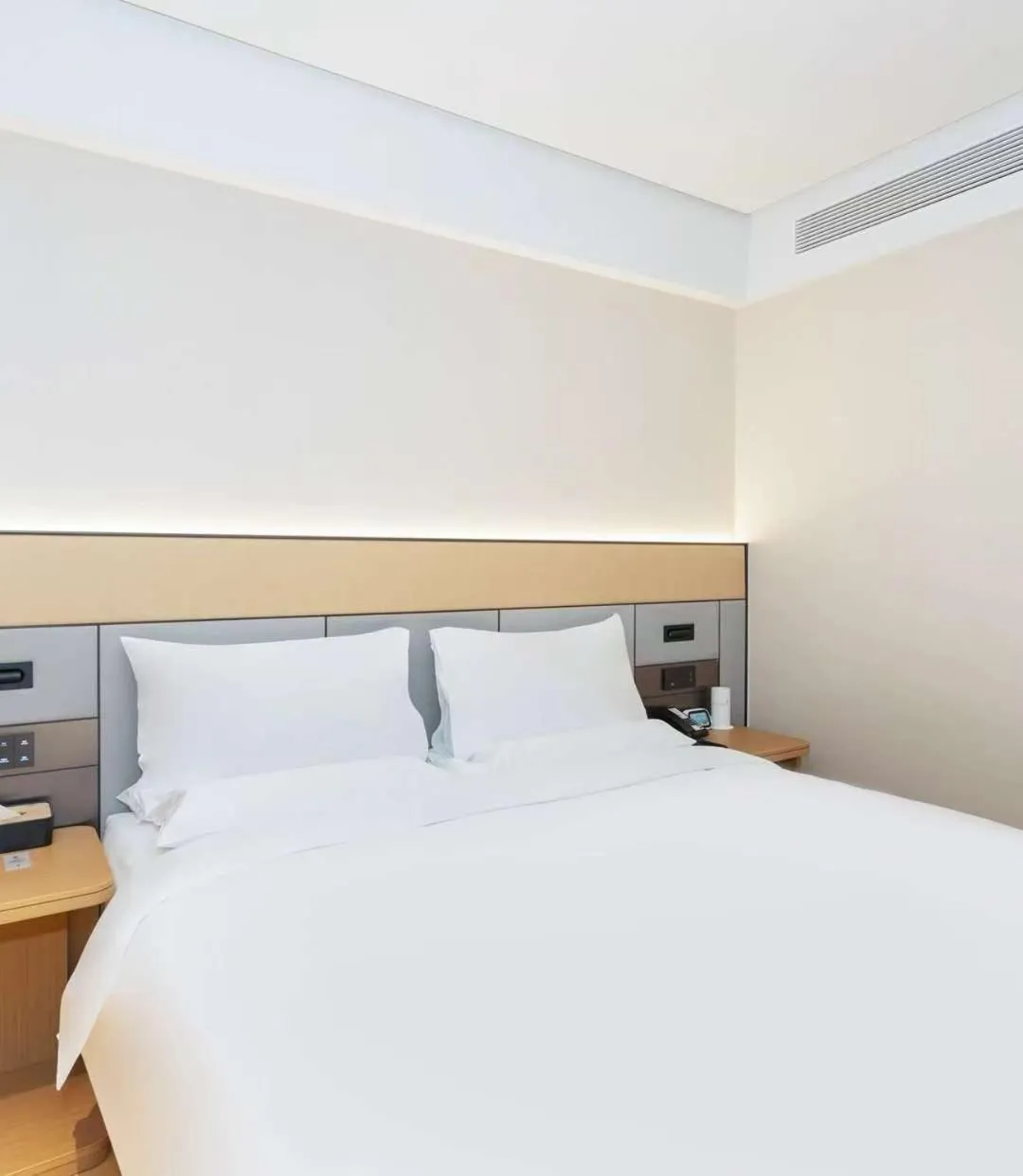 Bed in JI Hotel Guangzhou Fangcun Huadiwan