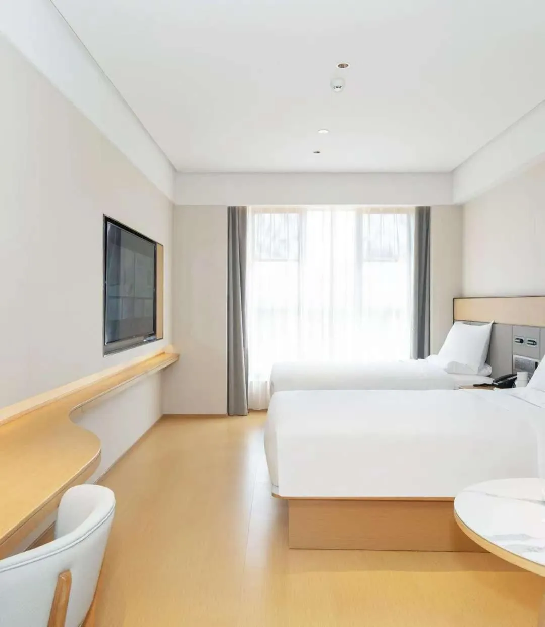 Bed in JI Hotel Guangzhou Fangcun Huadiwan