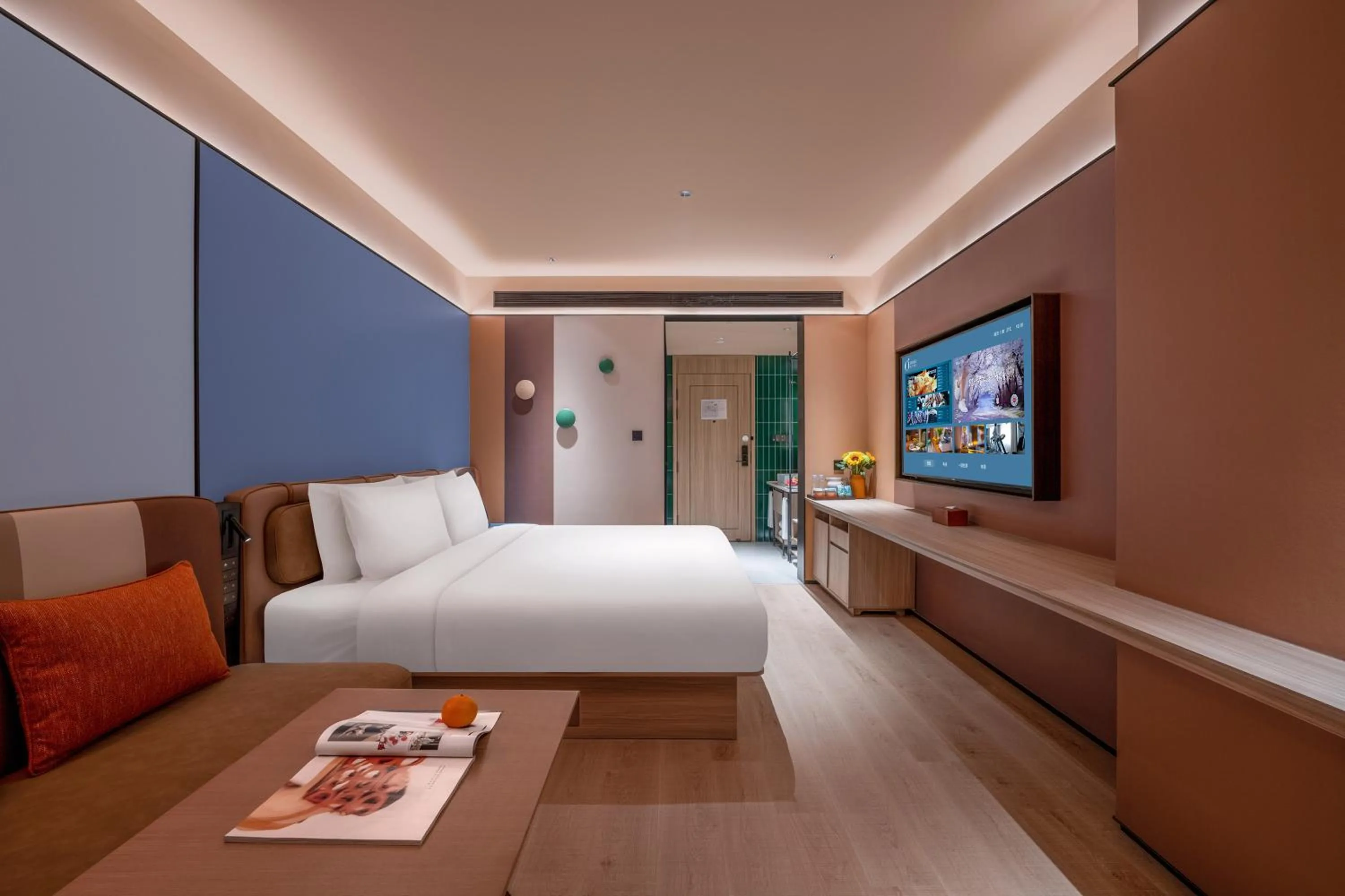 Communal lounge/ TV room, Bed in Orange Hotel Beijing Wukesong Dacheng Road