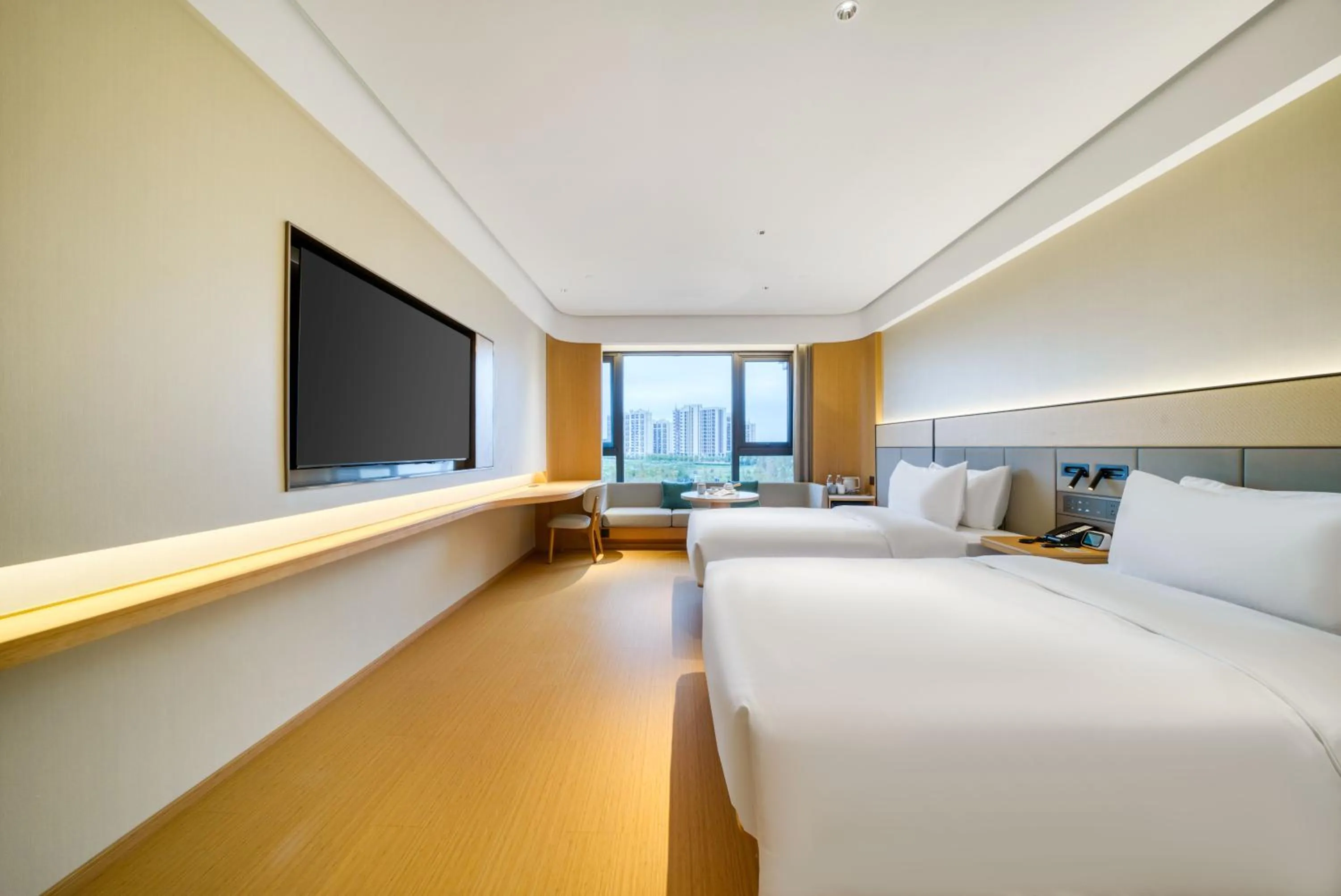 Bed in JI Hotel Shanghai Chongming Changxing Island